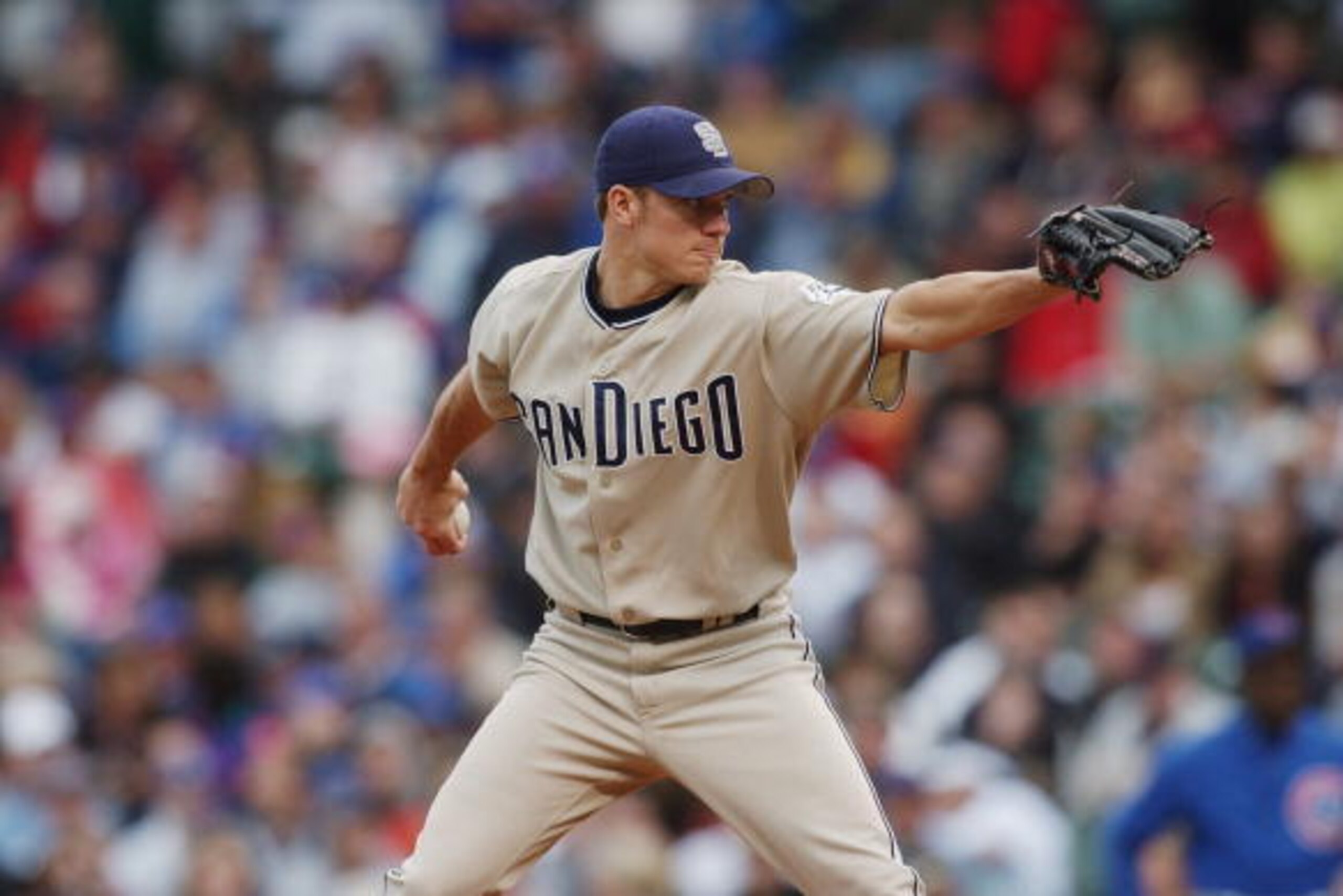 CHICAGO - AUGUST 12:  Jake Peavy #44 of the San Diego Padres delivers a pitch during the game against the Chicago Cubs at Wrigley Field on August 12, 2004 in Chicago, Illinois.  The Padres won 5-4. (Photo by Jonathan Daniel/Getty Images)