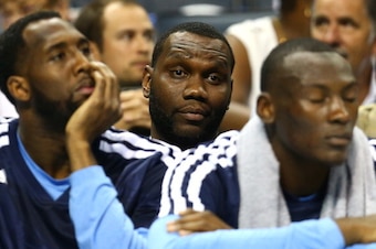 CHARLOTTE, NC - APRIL 28:  Al Jefferson #25 of the Charlotte Bobcats sits behind the bench as he was unable to play due to injury in Game Four of the Eastern Conference Quarterfinals during the 2014 NBA Playoffs at Time Warner Cable Arena on April 28, 201