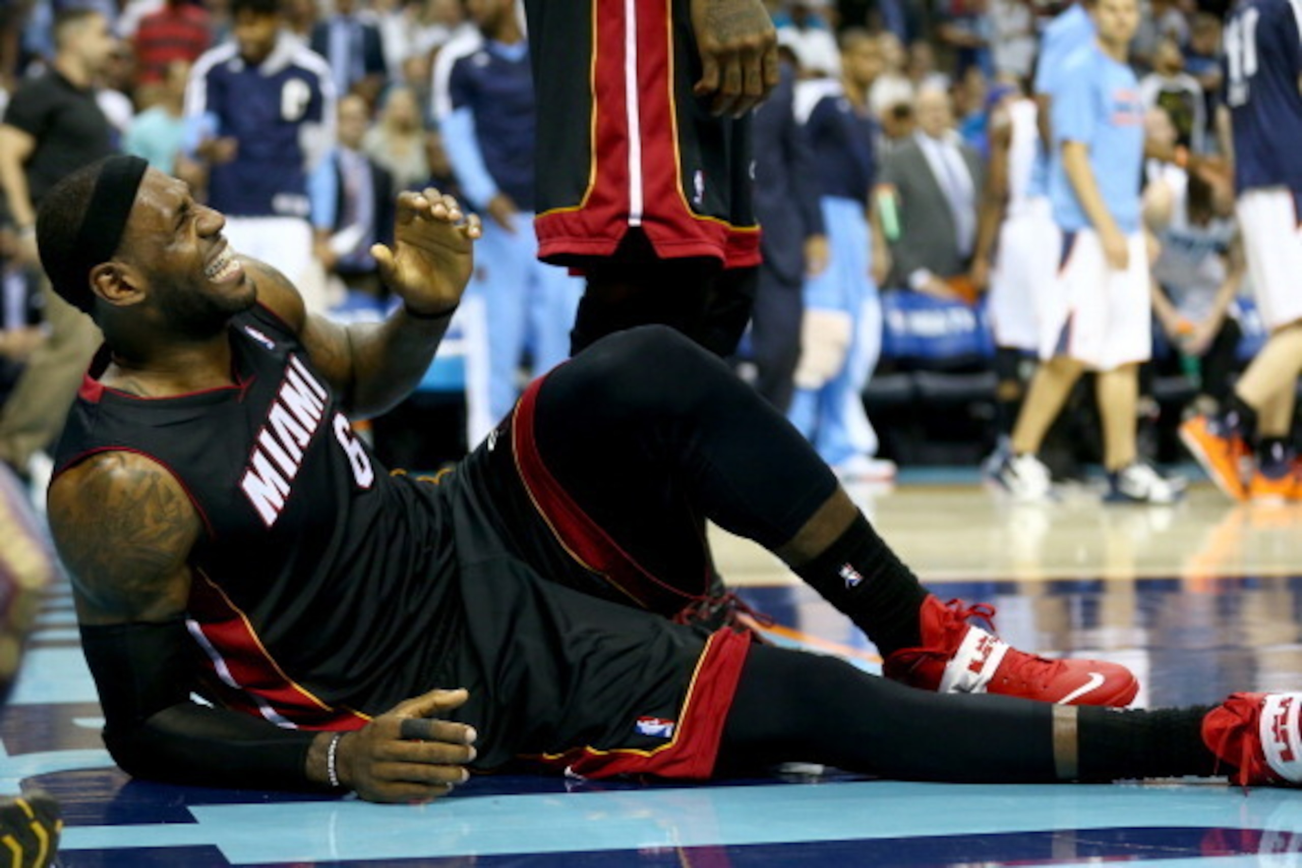 CHARLOTTE, NC - APRIL 28:  LeBron James #6 of the Miami Heat is injured against the Charlotte Bobcats in Game Four of the Eastern Conference Quarterfinals during the 2014 NBA Playoffs at Time Warner Cable Arena on April 28, 2014 in Charlotte, North Caroli