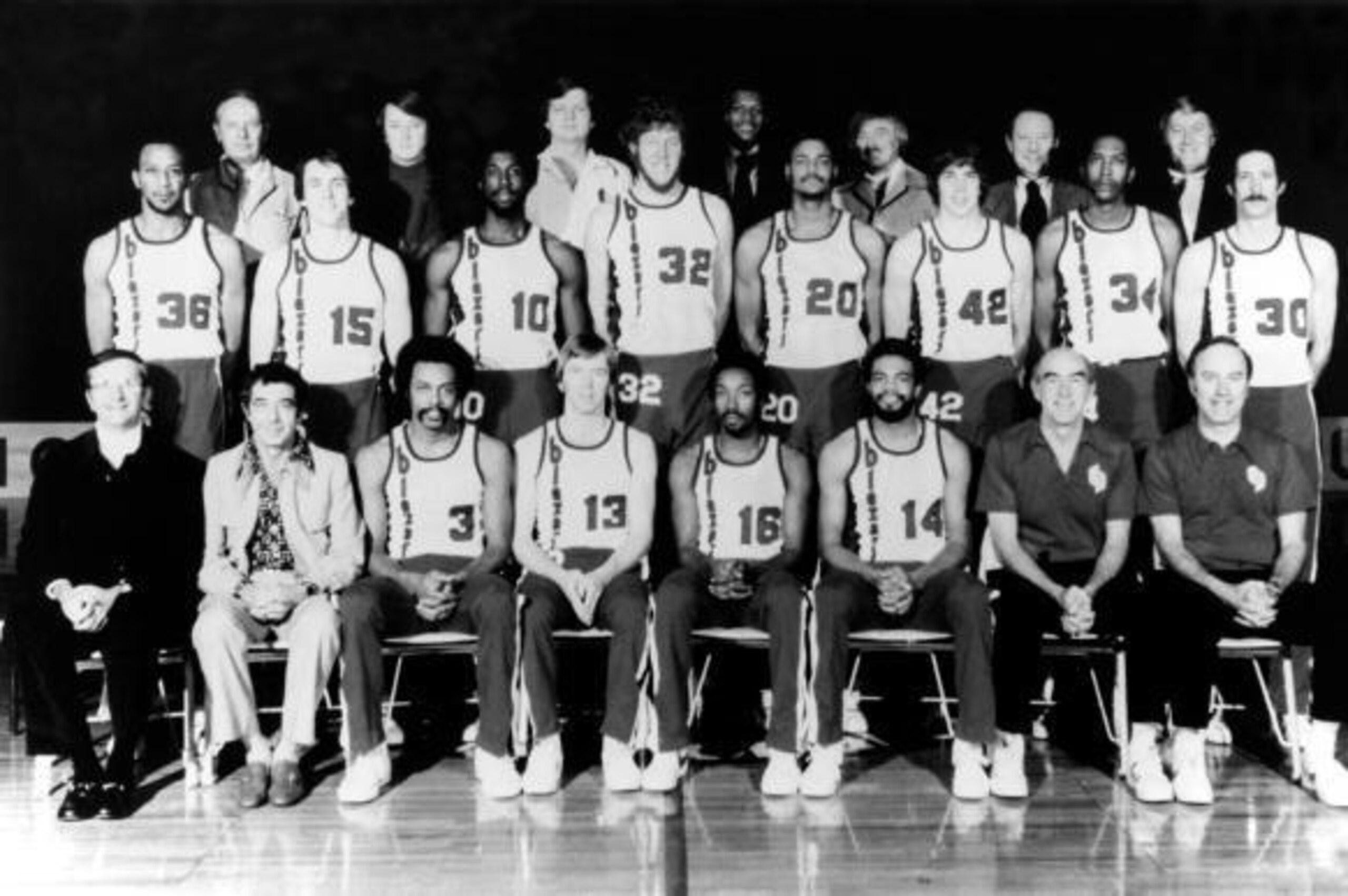 PORTLAND, OR - 1977:  The 1977 World Champions of basketball Portland Trail Blazers pose for a team portrait in Portland, Oregon.   Seated (L-R): President Larry Weinberg, General Manager Harry Glickman, Herm Gilliam, Dave Twardzik, Johnny Davis, Lionel H