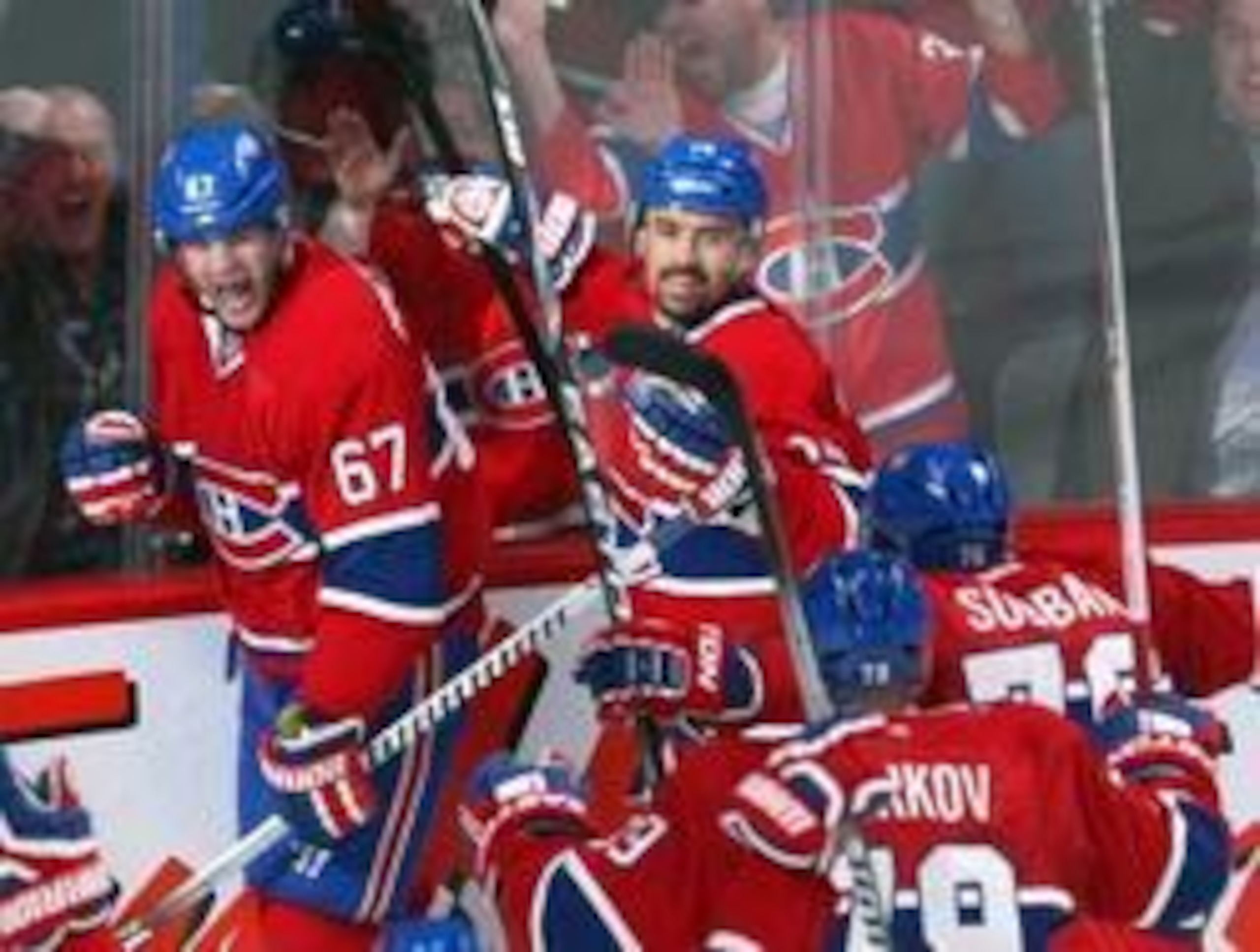 Apr 22, 2014; Montreal, Quebec, CAN; Montreal Canadiens left wing Max Pacioretty (67) celebrates his goal against Tampa Bay Lightning with teammates defenseman Andrei Markov (79) and defenseman P.K. Subban (76) and center Tomas Plekanec (14) during the th
