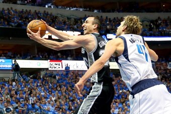 DALLAS, TX - APRIL 28: Manu Ginobili #20 of the San Antonio Spurs takes a shot against Dirk Nowitzki #41 of the Dallas Mavericks in Game Four of the Western Conference Quarterfinals during the 2014 NBA Playoffs at American Airlines Center on April 28, 20 DALLAS, TX - APRIL 28: Manu Ginobili #20 of the San Antonio Spurs takes a shot against Dirk Nowitzki #41 of the Dallas Mavericks in Game Four of the Western Conference Quarterfinals during the 2014 NBA Playoffs at American Airlines Center on April 28, 20