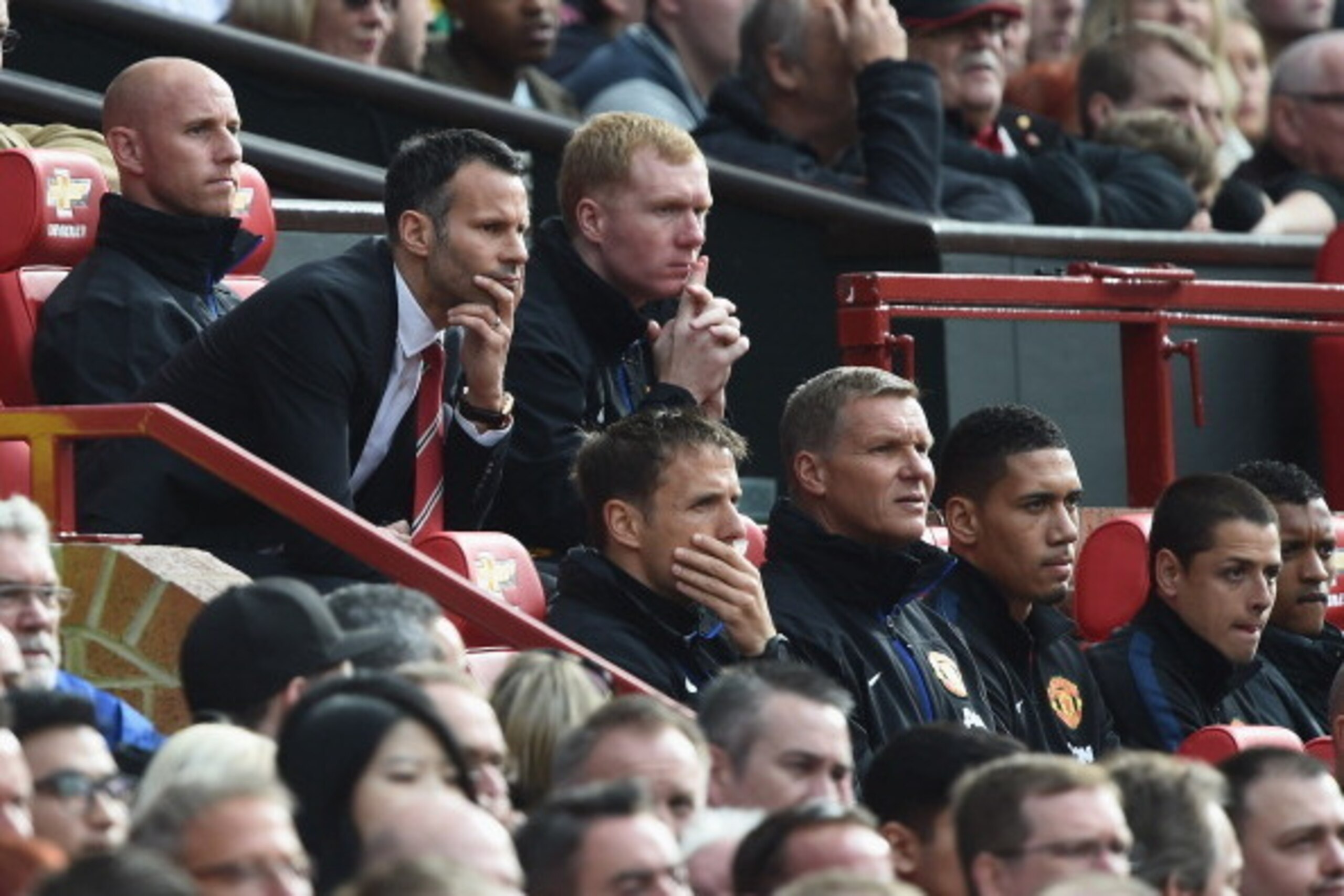 MANCHESTER, ENGLAND - APRIL 26:  Ryan Giggs of Manchester United looks on from the dug out during the Barclays Premier League match between Manchester United and Norwich City at Old Trafford on April 26, 2014 in Manchester, England.  (Photo by Laurence Gr