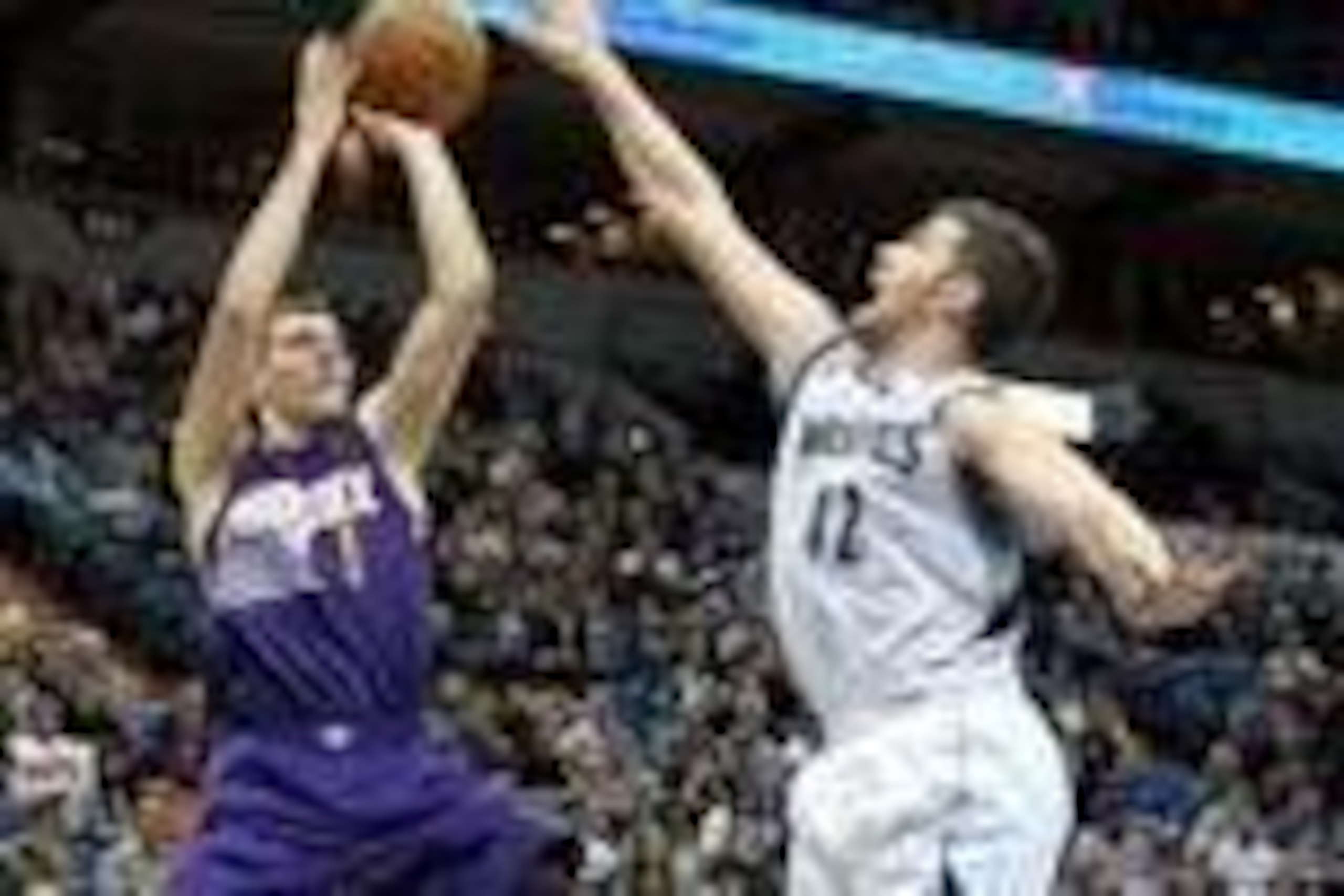Jan 8, 2014; Minneapolis, MN, USA; Phoenix Suns guard Goran Dragic (1) is fouled by Minnesota Timberwolves forward Kevin Love (42) during the second quarter at Target Center. Mandatory Credit: Brace Hemmelgarn-USA TODAY Sports