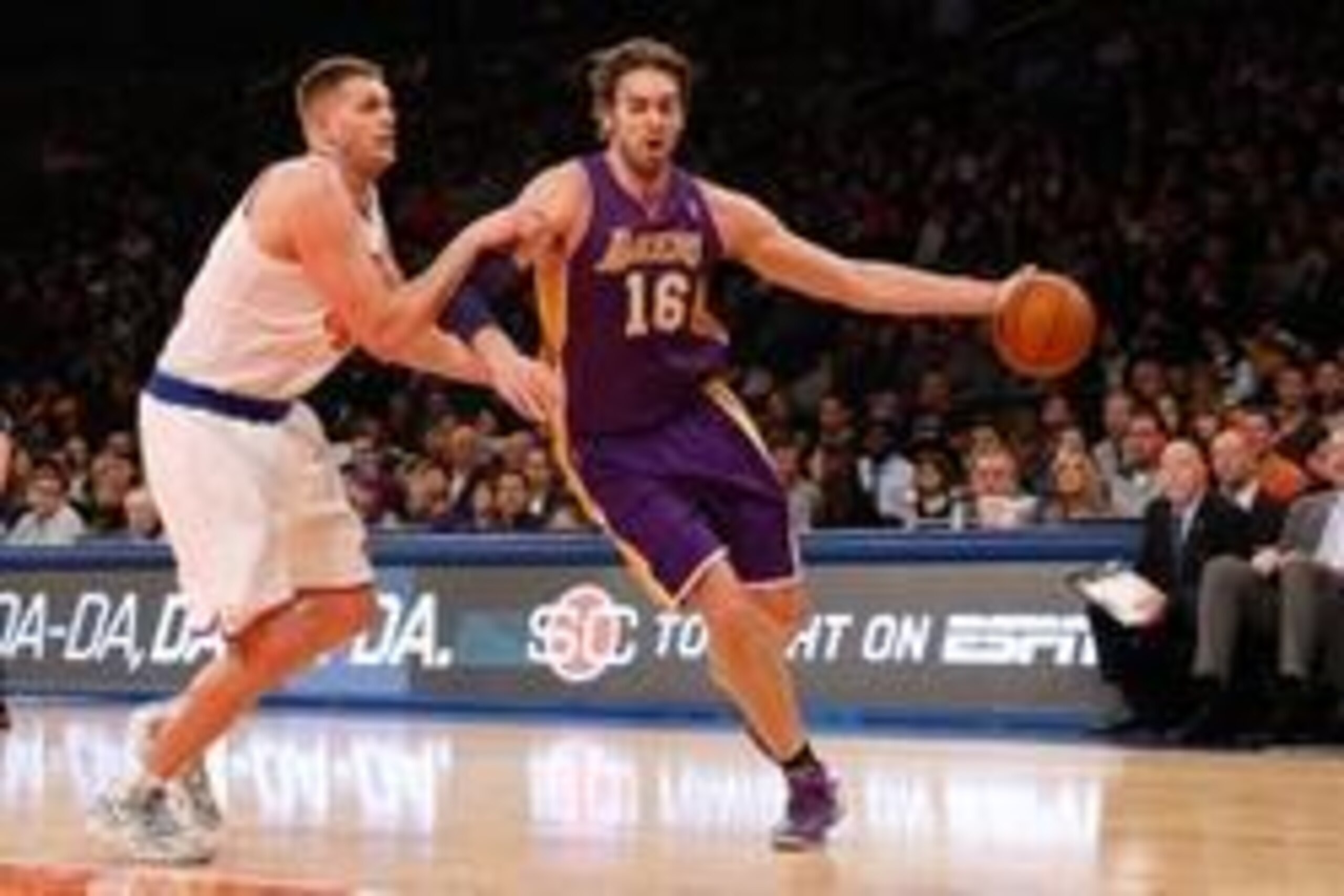 Jan 26, 2014; New York, NY, USA;  Los Angeles Lakers center Pau Gasol (16) dribbles the ball New York Knicks center Cole Aldrich (45) during the first quarter at Madison Square Garden. Mandatory Credit: Anthony Gruppuso-USA TODAY Sports