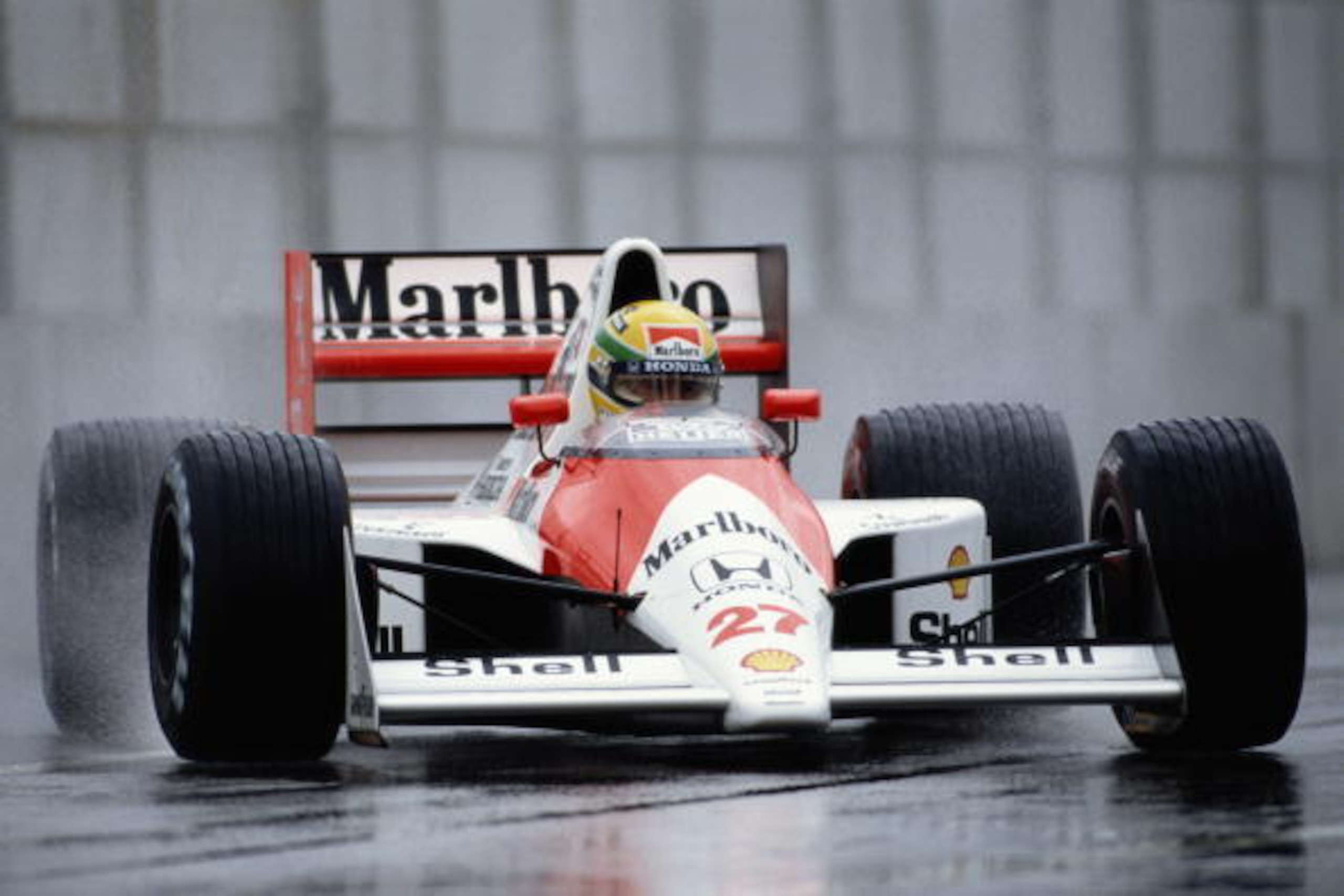 Ayrton Senna driving the Marlboro McLaren-Honda MP4/5B  in the rain during practice for the Grand Prix of the USA on 10 March 1990 at the Phoenix street course in Phoenix, United States. (Photo by Pascal Rondeau/Getty Images)
