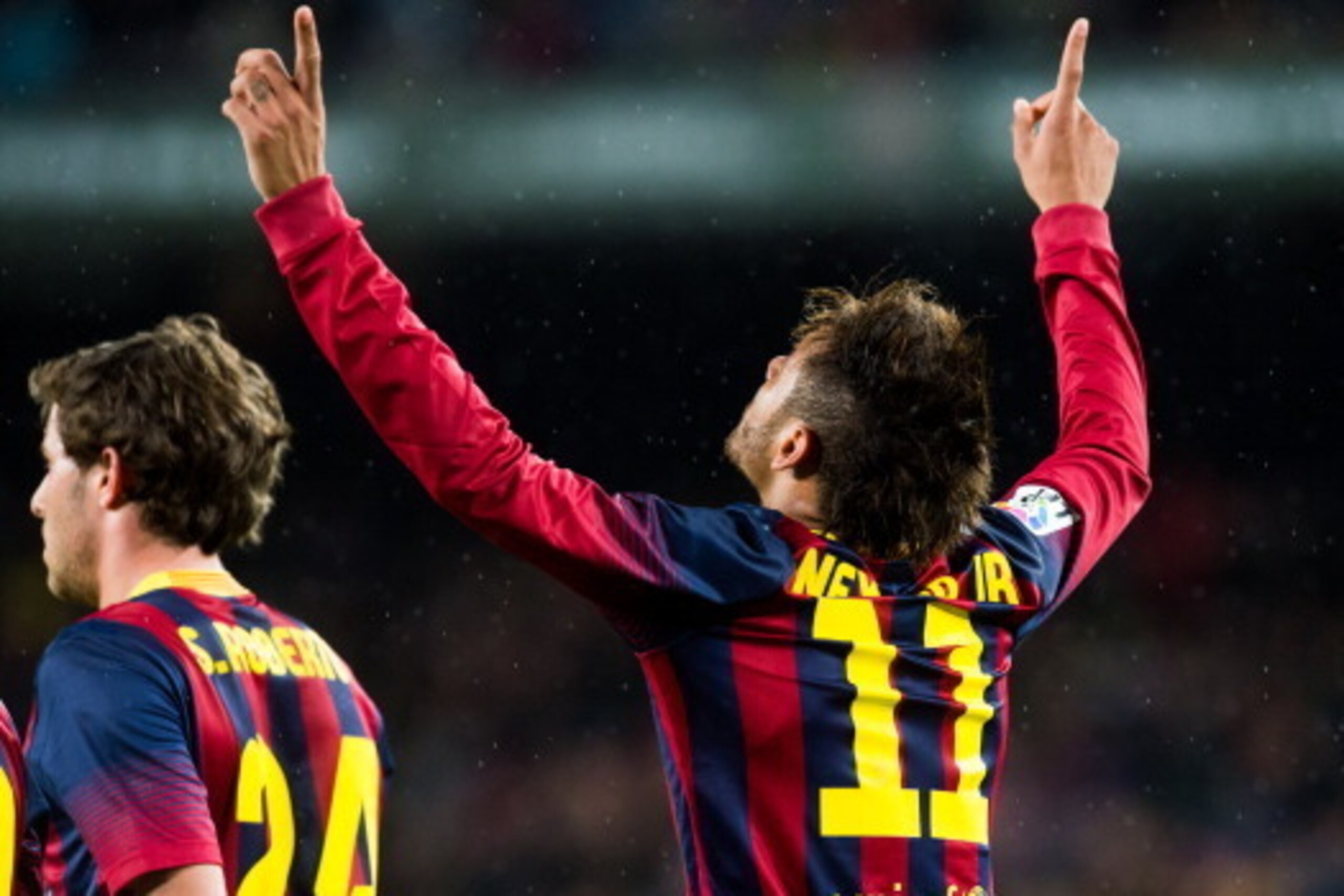 BARCELONA, SPAIN - MARCH 26: Neymar Santos Jr of FC Barcelona celebrates after scoring his team's third goal during the La Liga match between FC Barcelona and RC Celta de Vigo at Camp Nou on March 26, 2014 in Barcelona, Spain. (Photo by Alex Caparros/Gett