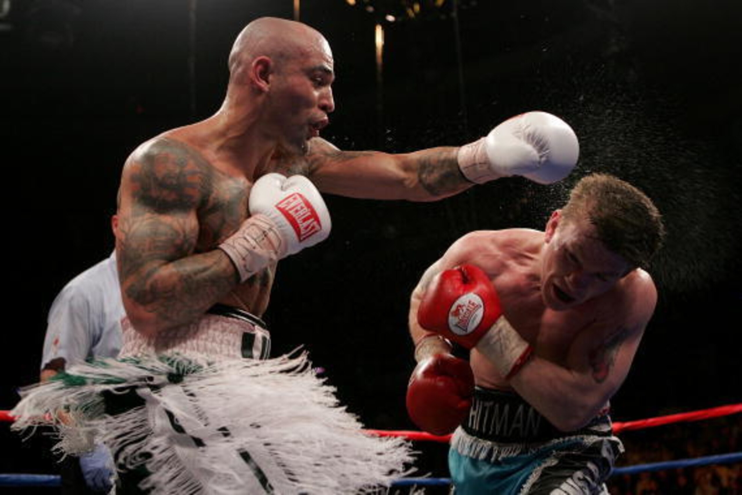 BOSTON - MAY 13: Luis Collazo (L) follows through on a left to Ricky Hatton of England during their Welterweight WBA World Title fight at the TD Banknorth Garden on May 13, 2006 in Boston, Massachusetts. (Photo by Nick Laham/Getty Images) BOSTON - MAY 13: Luis Collazo (L) follows through on a left to Ricky Hatton of England during their Welterweight WBA World Title fight at the TD Banknorth Garden on May 13, 2006 in Boston, Massachusetts. (Photo by Nick Laham/Getty Images)