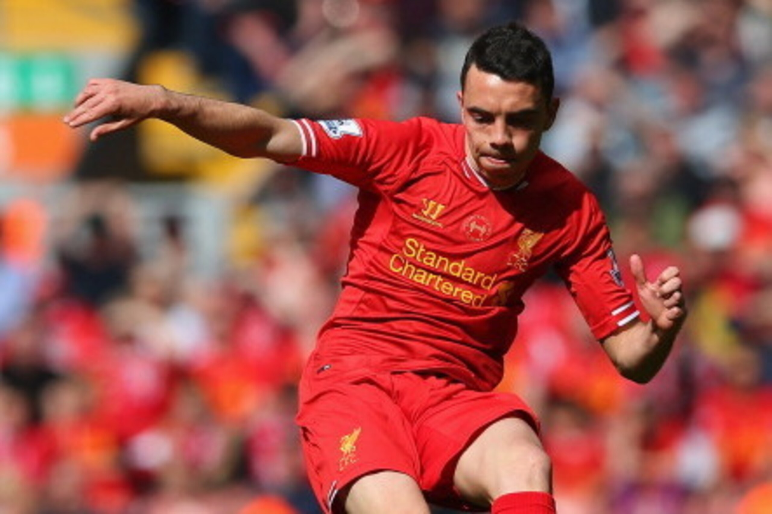 LIVERPOOL, ENGLAND - APRIL 27: Iago Aspas of Liverpool in action during the Barclays Premier League match between Liverpool and Chelsea at Anfield on April 27, 2014 in Liverpool, England.  (Photo by Clive Brunskill/Getty Images)