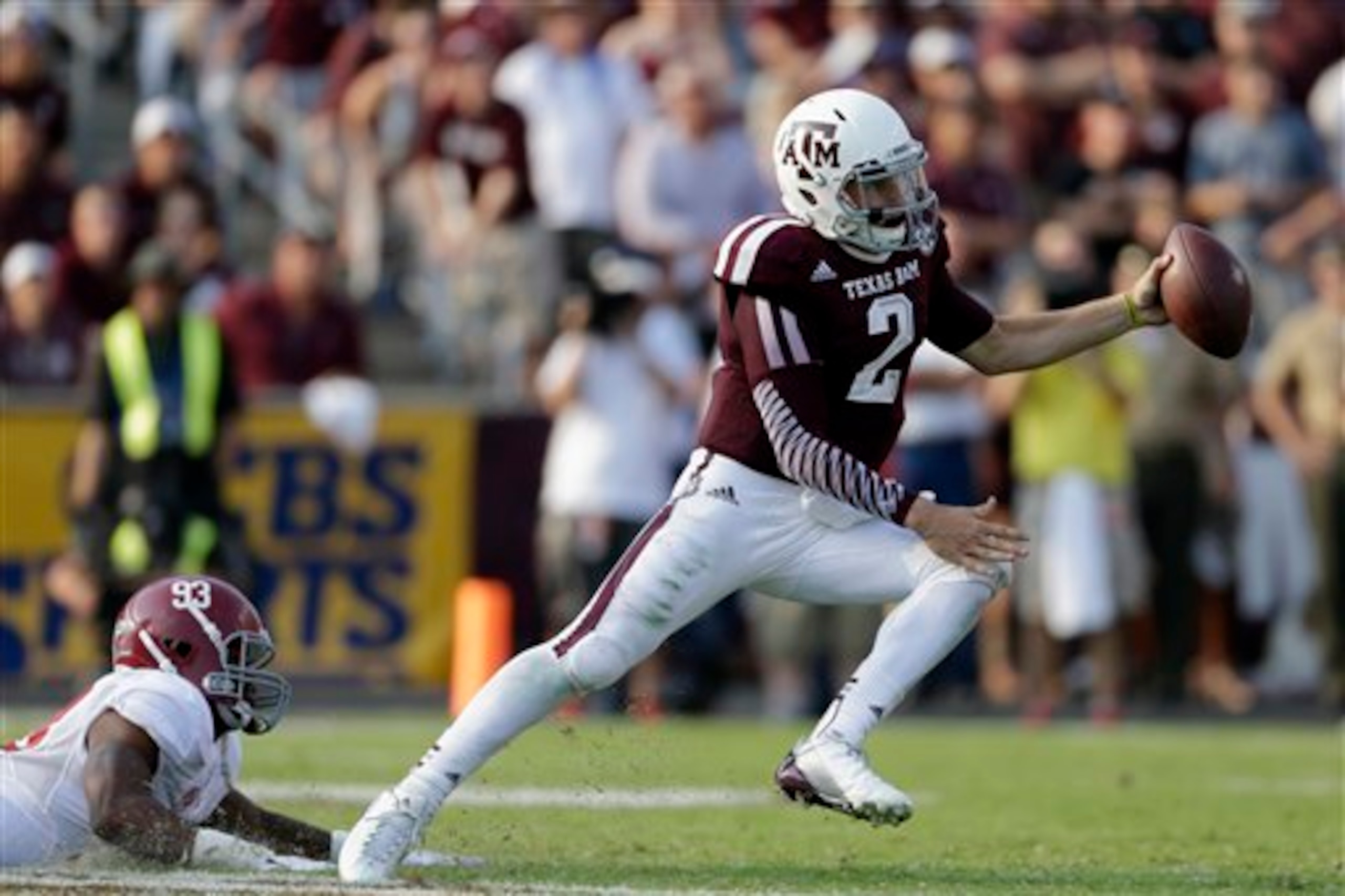 Johnny Manziel on the run in loss to Alabama.
