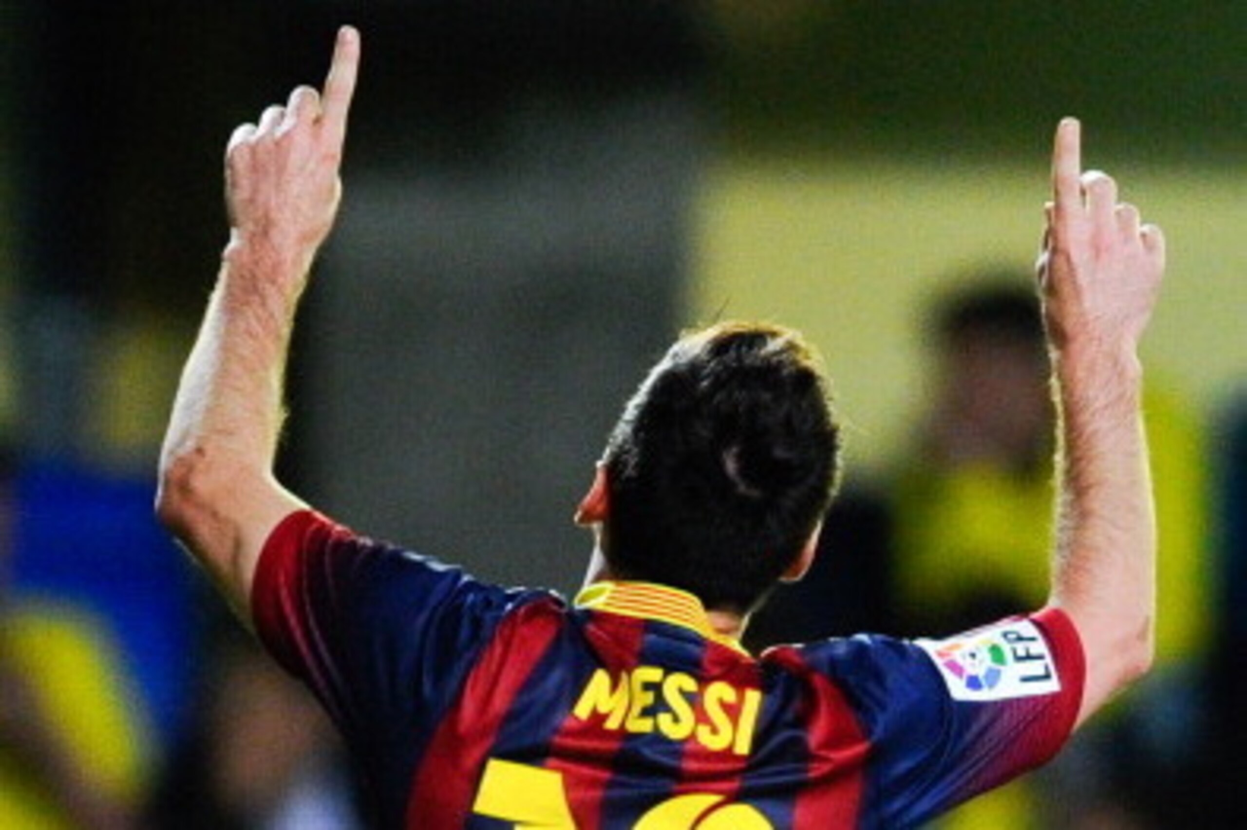 VILLARREAL, SPAIN - APRIL 27:  Lionel Messi of FC Barcelona celebrates after scoring his team's third goal during the La Liga match between Villarreal CF and FC Barcelona at El Madrigal on April 27, 2014 in Villarreal, Spain.  (Photo by David Ramos/Getty 