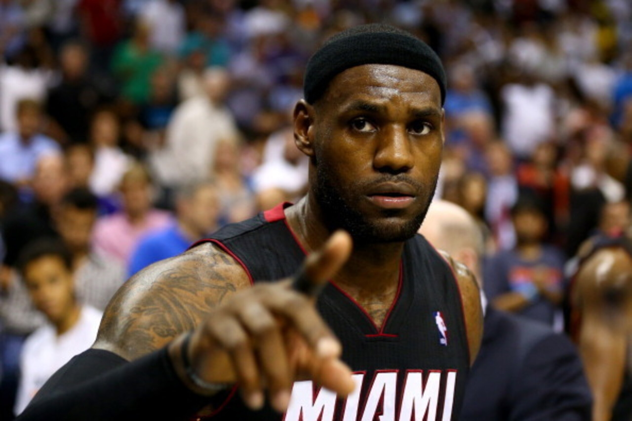 CHARLOTTE, NC - APRIL 28:  LeBron James #6 of the Miami Heat reacts after defeating the Charlotte Bobcats 109-98 in Game Four of the Eastern Conference Quarterfinals during the 2014 NBA Playoffs at Time Warner Cable Arena on April 28, 2014 in Charlotte, N