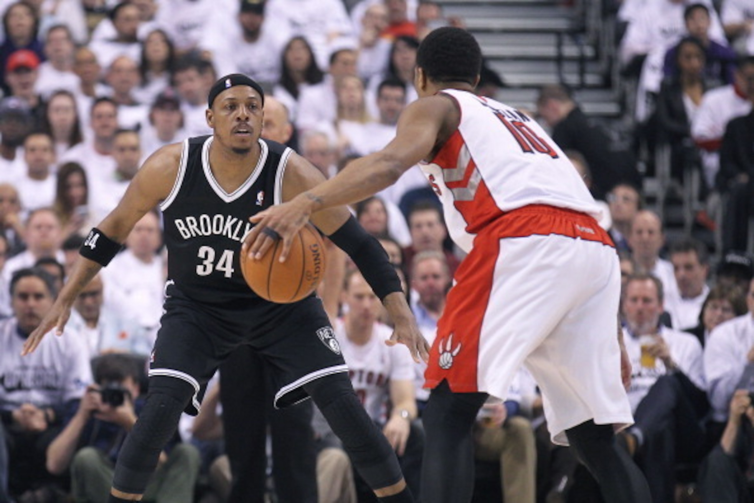 TORONTO, ON - APRIL 22:  Paul Pierce #34 of the Brooklyn Nets defends against DeMar DeRozan #10 of the Toronto Raptors in Game Two of the NBA Eastern Conference Play-off at the Air Canada Centre on April 22, 2014 in Toronto, Ontario, Canada. The Raptors d
