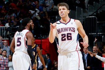 ATLANTA, GA - APRIL 24:  DeMarre Carroll #5 and Kyle Korver #26 of the Atlanta Hawks react after a basket in Game 3 of the Eastern Conference Quarterfinals during the 2014 NBA Playoffs against the Indiana Pacers at Philips Arena on April 24, 2014 in Atlan