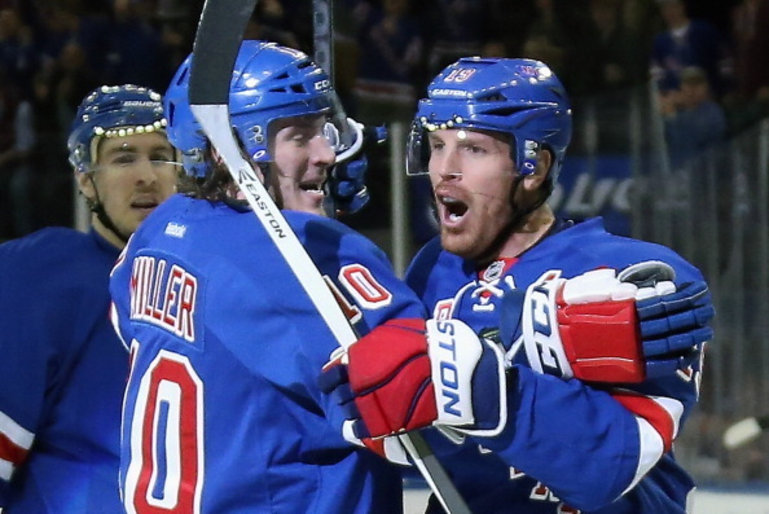 NEW YORK, NY - APRIL 27:  Brad Richards #19 of the New York Rangers (R) celebrates his second period goal along with J.T. Miller #10 (L) against the Philadelphia Flyers in Game Five of the First Round of the 2014 NHL Stanley Cup Playoffs at Madison Square