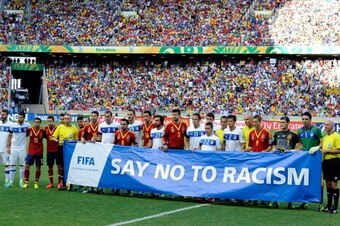 FORTALEZA, BRAZIL - JUNE 27:  The Spain and Italy players display an anti-racism message to the crowd prior to the FIFA Confederations Cup Brazil 2013 Semi Final match between Spain and Italy at Castelao on June 27, 2013 in Fortaleza, Brazil.  (Photo by C