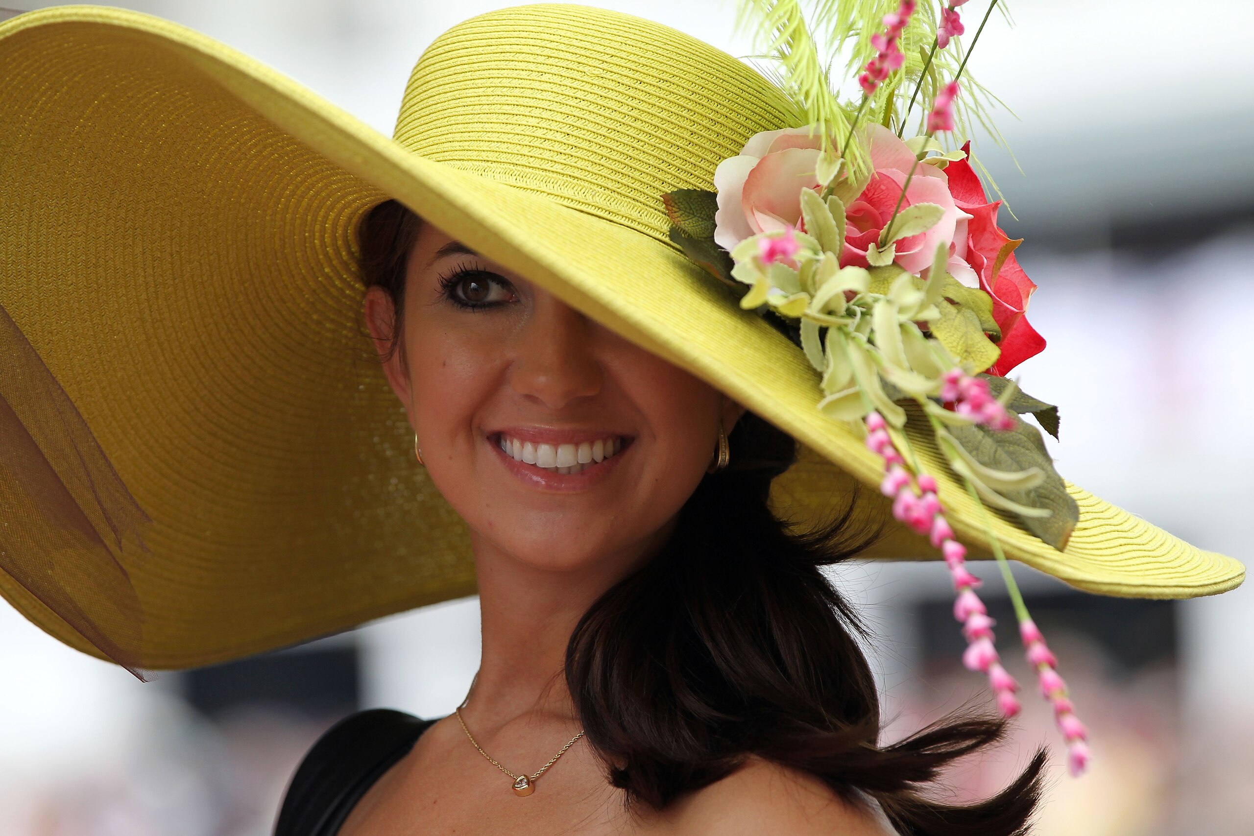 LOUISVILLE, KY - MAY 07: A fan looks on wearing her derby hat during the 137th Kentucky Derby at Churchill Downs on May 7, 2011 in Louisville, Kentucky. (Photo by Jamie Squire/Getty Images) LOUISVILLE, KY - MAY 07: A fan looks on wearing her derby hat during the 137th Kentucky Derby at Churchill Downs on May 7, 2011 in Louisville, Kentucky. (Photo by Jamie Squire/Getty Images)