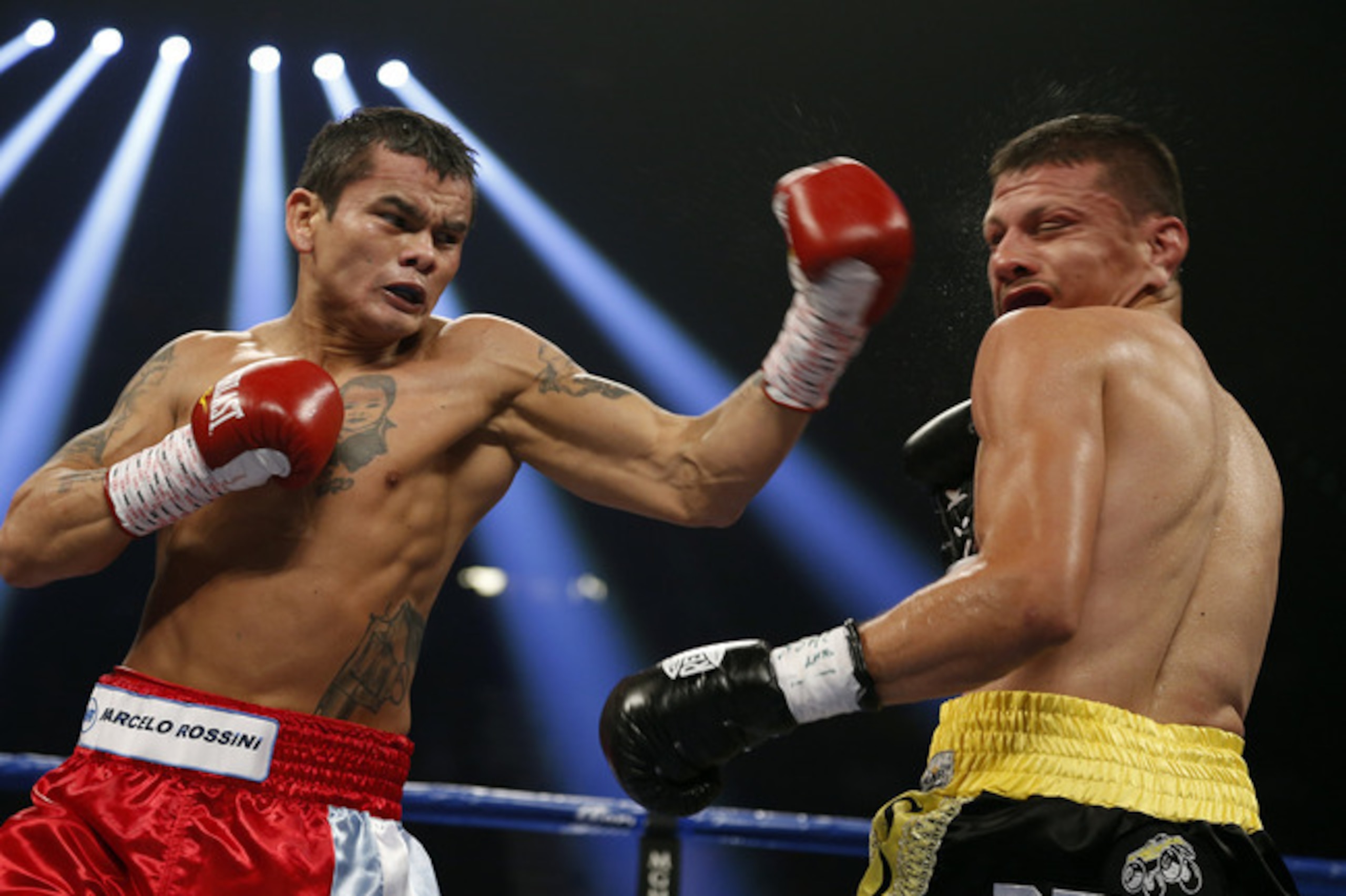 Maidana (left) lands a head-turning left hook on Jesus Soto Karass.