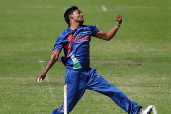 TOWNSVILLE, AUSTRALIA - APRIL 07:  Sandeep Sharma of India bowls during the match between Australia and India on day two of the U19 International Quad Series at Tony Ireland Stadium on April 7, 2012 in Townsville, Australia.  (Photo by Ian Hitchcock/Getty