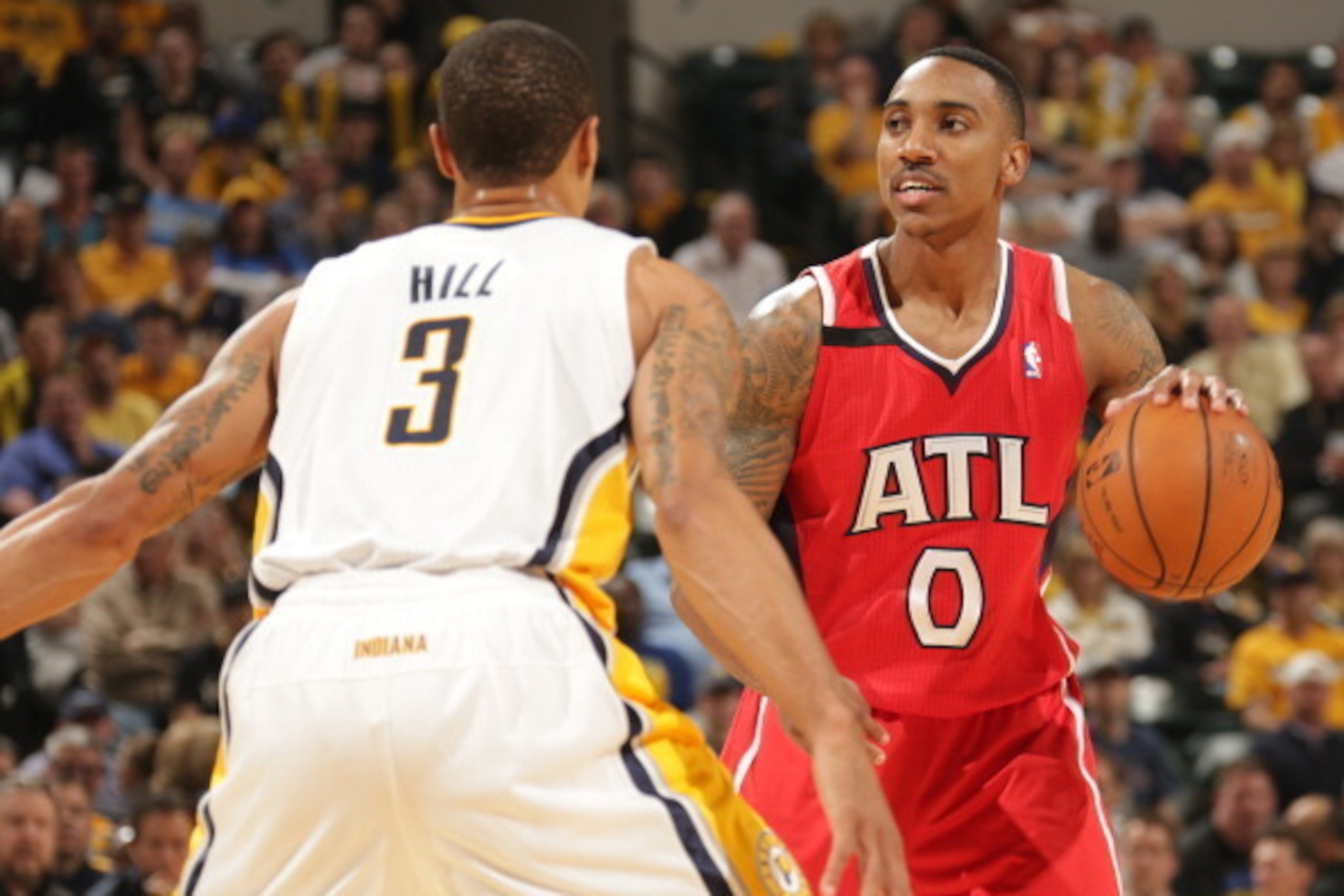 INDIANAPOLIS - APRIL 28: Jeff Teague #0 of the Atlanta Hawks handles the ball against the Indiana Pacers in Game Five of the Eastern Conference Quarterfinals at Bankers Life Fieldhouse on April 28, 2014 in Indianapolis, Indiana. NOTE TO USER: User expres INDIANAPOLIS - APRIL 28: Jeff Teague #0 of the Atlanta Hawks handles the ball against the Indiana Pacers in Game Five of the Eastern Conference Quarterfinals at Bankers Life Fieldhouse on April 28, 2014 in Indianapolis, Indiana. NOTE TO USER: User expres