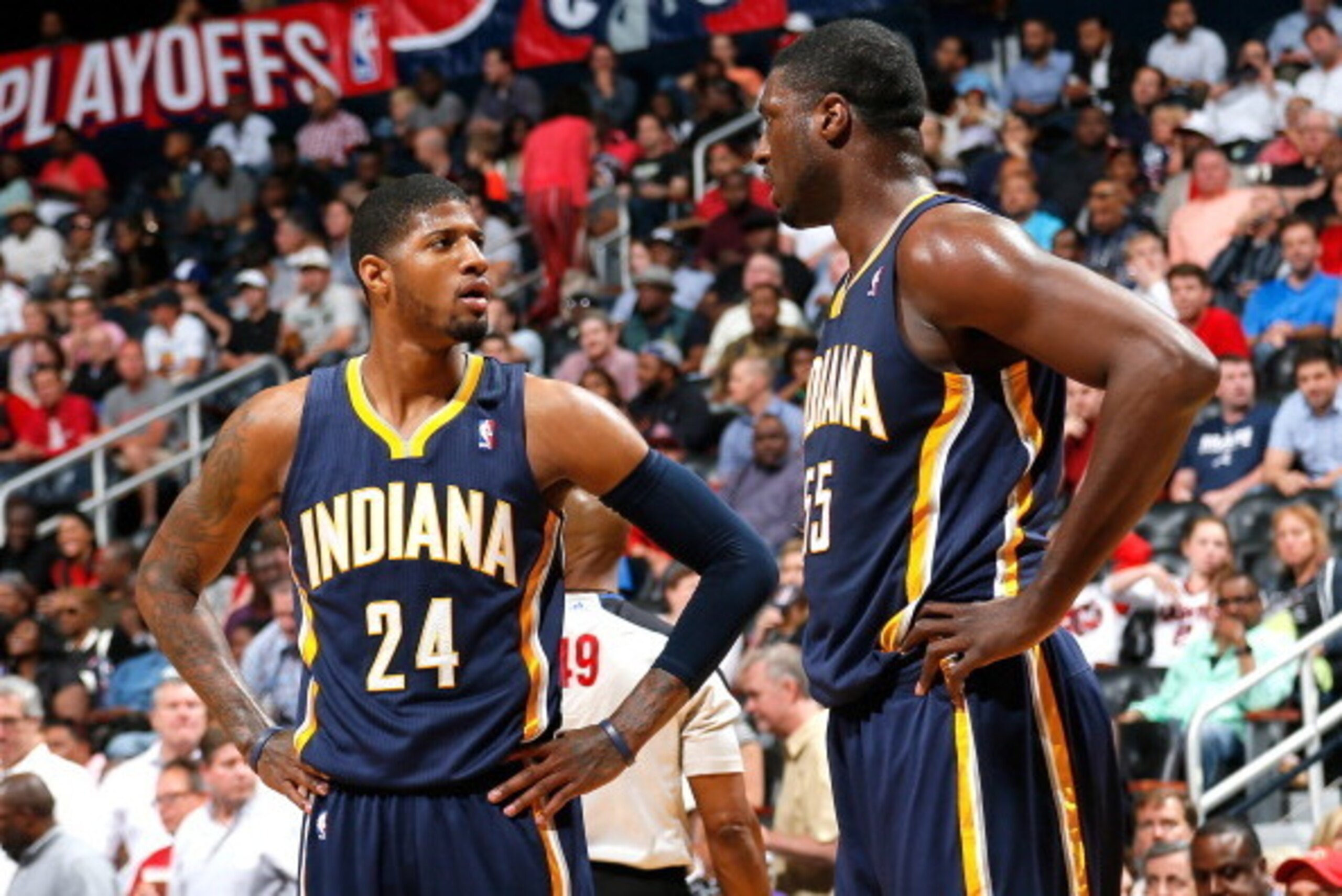 ATLANTA, GA - APRIL 24: Paul George #24 and Roy Hibbert #55 of the Indiana Pacers react after a foul in Game 3 of the Eastern Conference Quarterfinals during the 2014 NBA Playoffs against the Atlanta Hawks at Philips Arena on April 24, 2014 in Atlanta, G ATLANTA, GA - APRIL 24: Paul George #24 and Roy Hibbert #55 of the Indiana Pacers react after a foul in Game 3 of the Eastern Conference Quarterfinals during the 2014 NBA Playoffs against the Atlanta Hawks at Philips Arena on April 24, 2014 in Atlanta, G