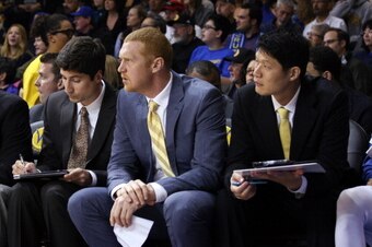 SANTA CRUZ - April 1:  Golden State Warriors Assistant coach Brian Scalabrine watches the Santa Cruz Warriors from the bench against the Bakersfield Jam on April 1, 2014 at Kaiser Permanente Arena in Santa Cruz, California. NOTE TO USER: User expressly ac