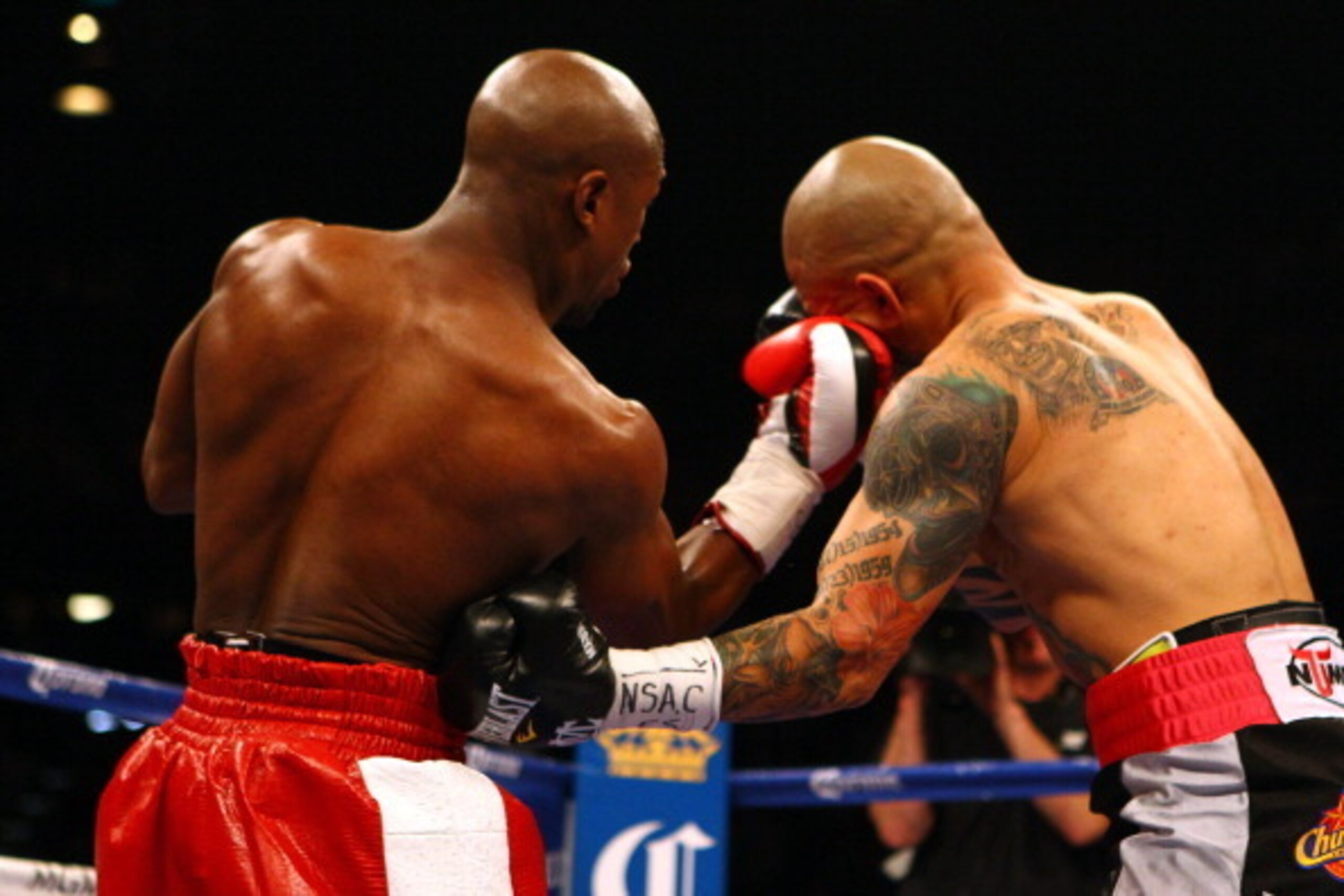 LAS VEGAS, NV - MAY 05:  (L-R) Floyd Mayweather Jr. throws a right to the face of Miguel Cotto during their WBA super welterweight title fight at the MGM Grand Garden Arena on May 5, 2012 in Las Vegas, Nevada.  (Photo by Al Bello/Getty Images)