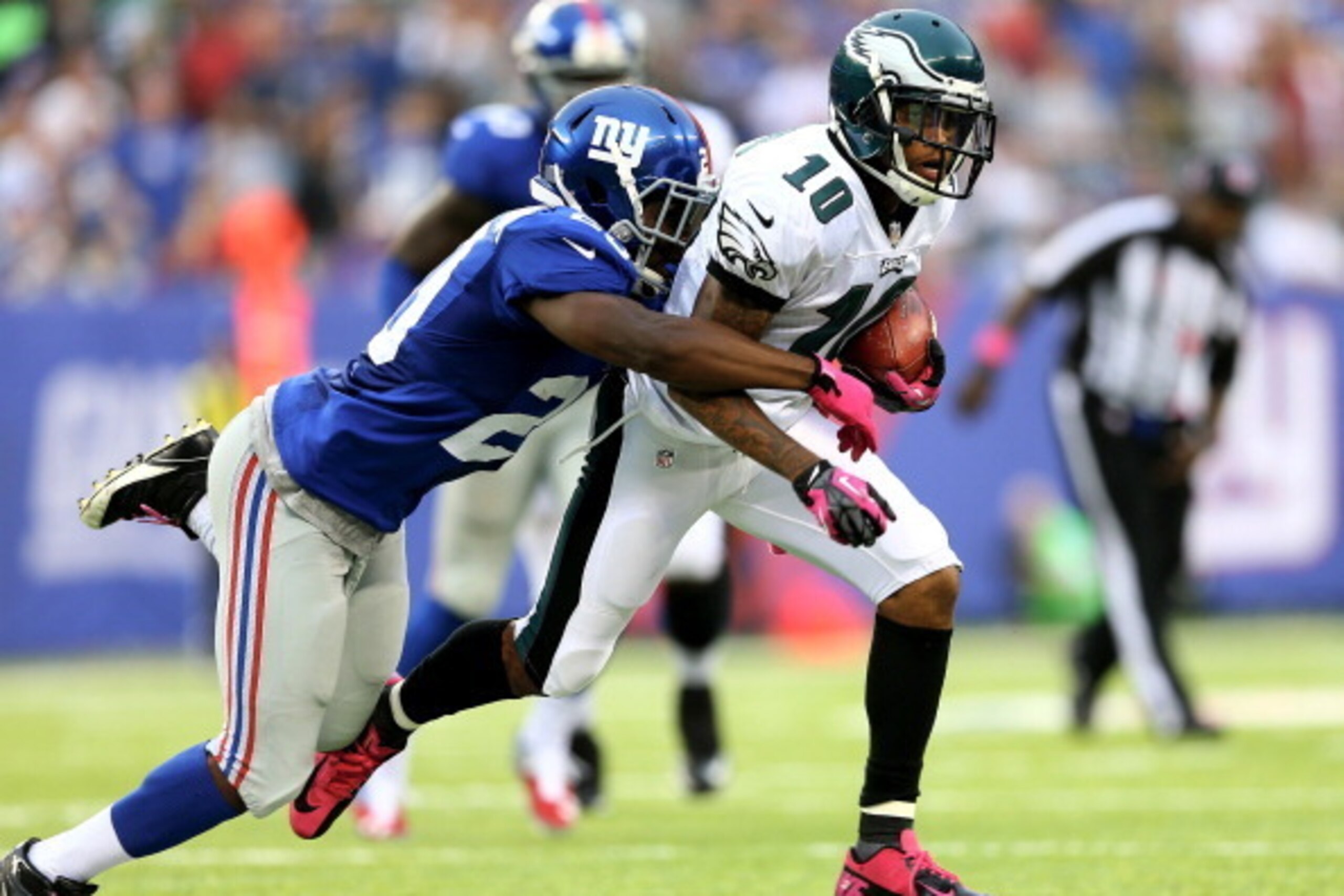 EAST RUTHERFORD, NJ - OCTOBER 06:  DeSean Jackson #10 of the Philadelphia Eagles carries the ball as  Prince Amukamara #20 of the New York Giants defends at MetLife Stadium on October 6, 2013 in East Rutherford, New Jersey.The Philadelphia Eagles defeated
