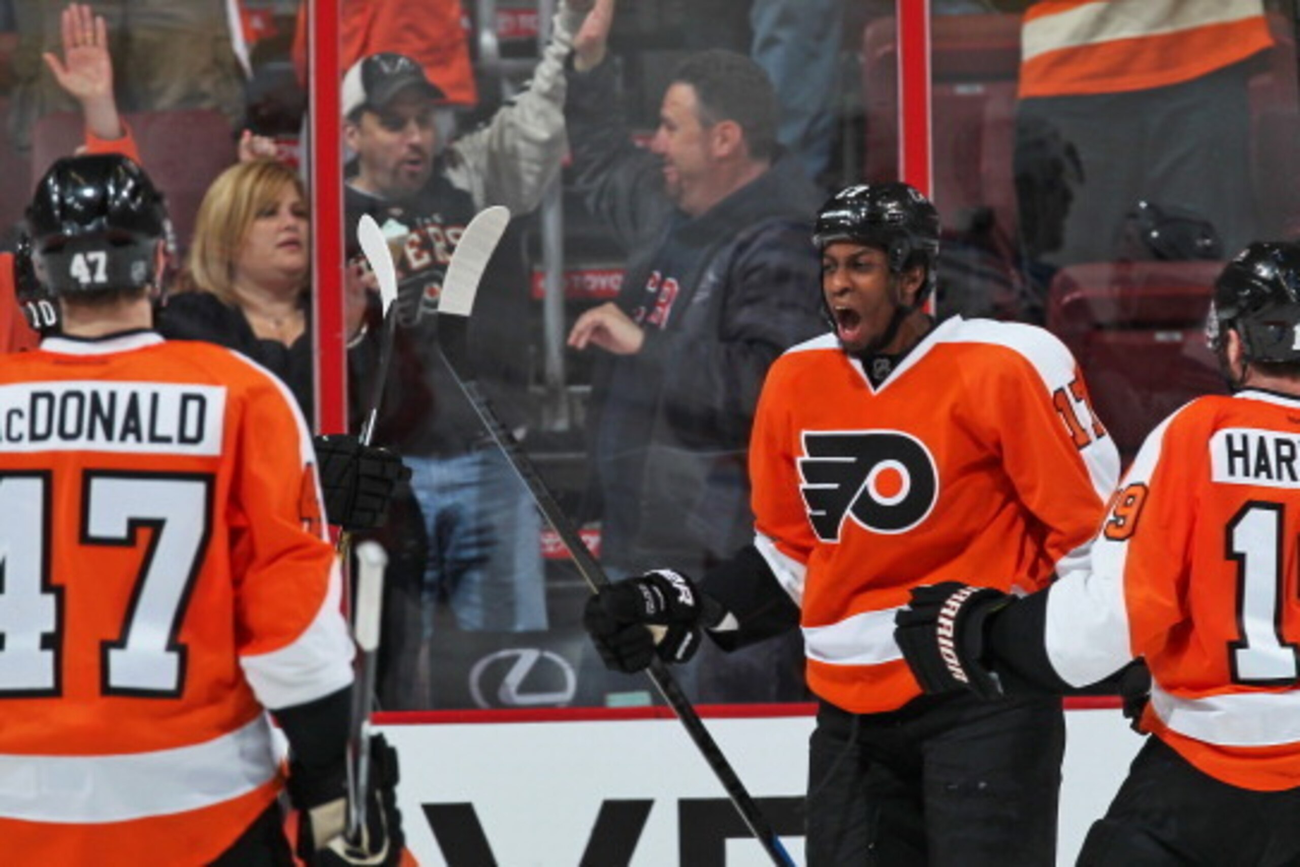 PHILADELPHIA, PA - APRIL 29: Wayne Simmonds #17 of the Philadelphia Flyers celebrates his second goal of the game against the New York Rangers with Andrew MacDonald #47 and Scott Hartnell #19 in Game Six of the First Round of the 2014 Stanley Cup Playoffs