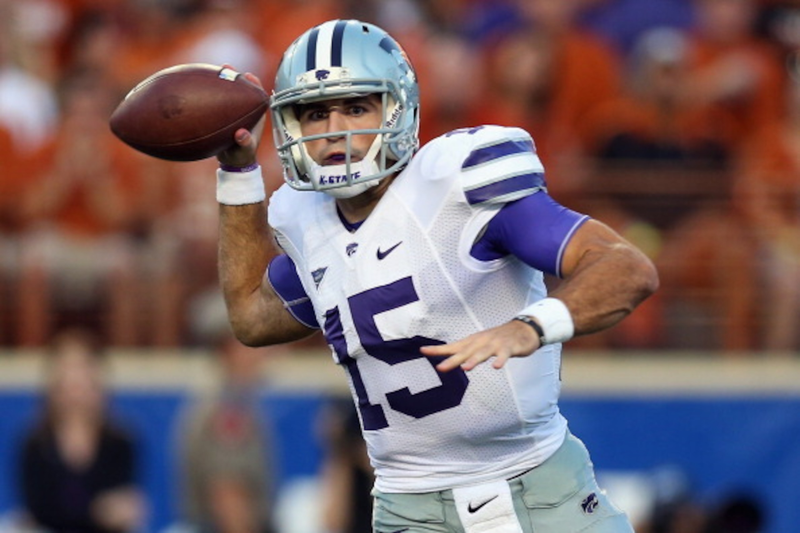 AUSTIN, TX - SEPTEMBER 21:  Jake Waters #15 of the Kansas State Wildcats throws against the Texas Longhorns at Darrell K Royal-Texas Memorial Stadium on September 21, 2013 in Austin, Texas.  (Photo by Ronald Martinez/Getty Images)