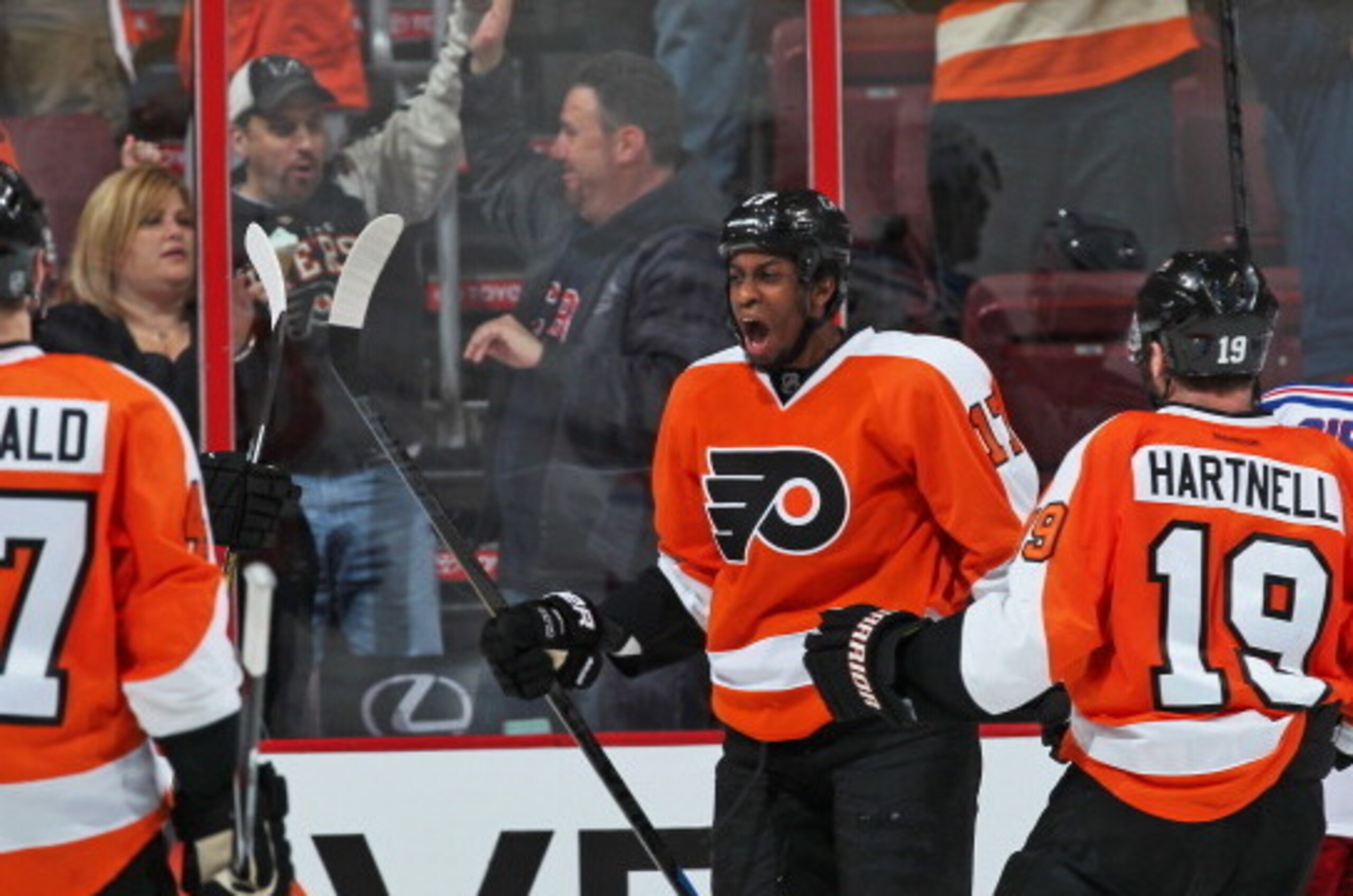 PHILADELPHIA, PA - APRIL 29: Wayne Simmonds #17 of the Philadelphia Flyers celebrates his second goal of the game against the New York Rangers with Andrew MacDonald #47 and Scott Hartnell #19 in Game Six of the First Round of the 2014 Stanley Cup Playoffs