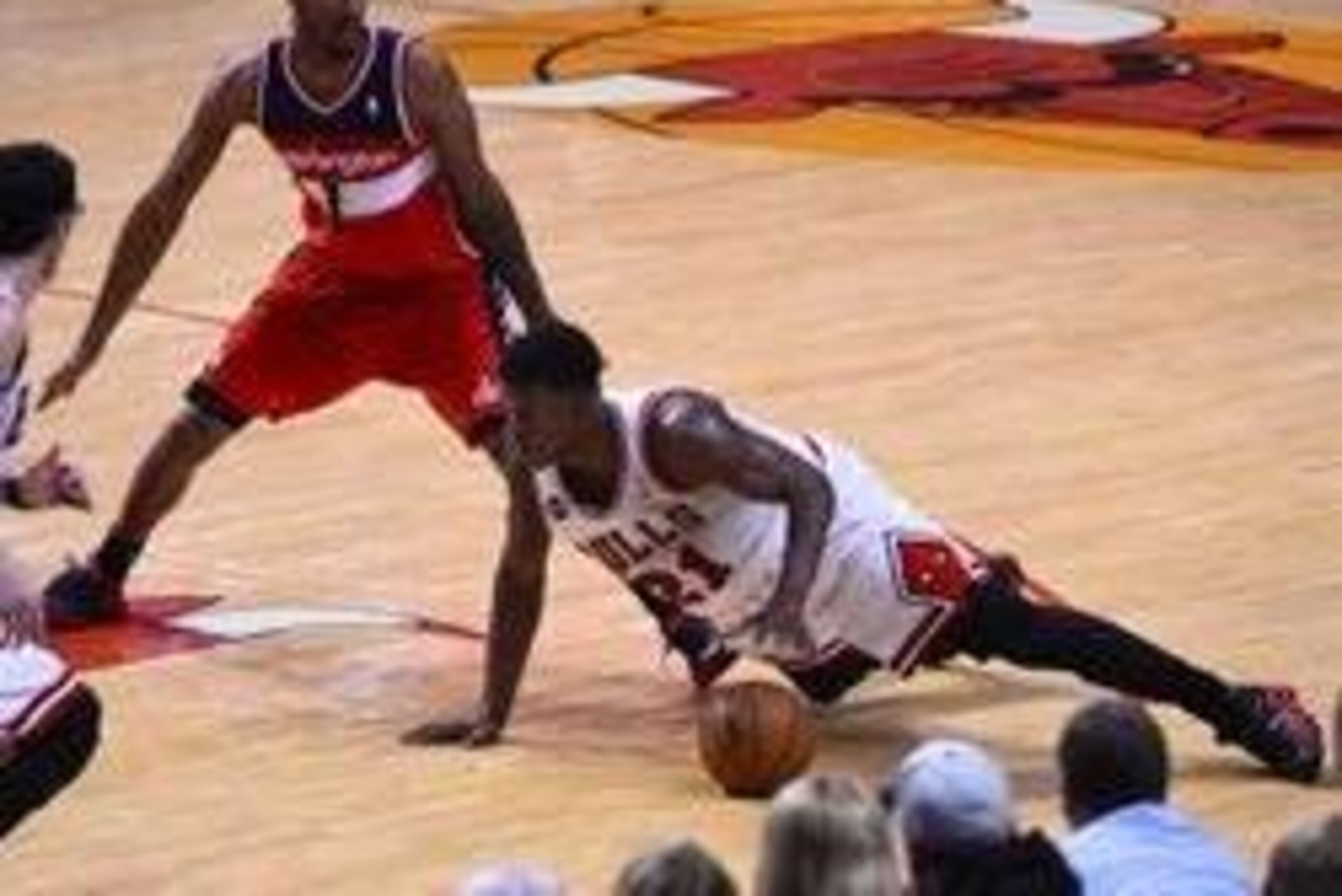Apr 29, 2014; Chicago, IL, USA; Chicago Bulls guard Jimmy Butler (21) dribbles the ball in front of Washington Wizards forward Trevor Ariza (1) during the second half in game five of the first round of the 2014 NBA Playoffs at United Center. The Wizards w Apr 29, 2014; Chicago, IL, USA; Chicago Bulls guard Jimmy Butler (21) dribbles the ball in front of Washington Wizards forward Trevor Ariza (1) during the second half in game five of the first round of the 2014 NBA Playoffs at United Center. The Wizards w