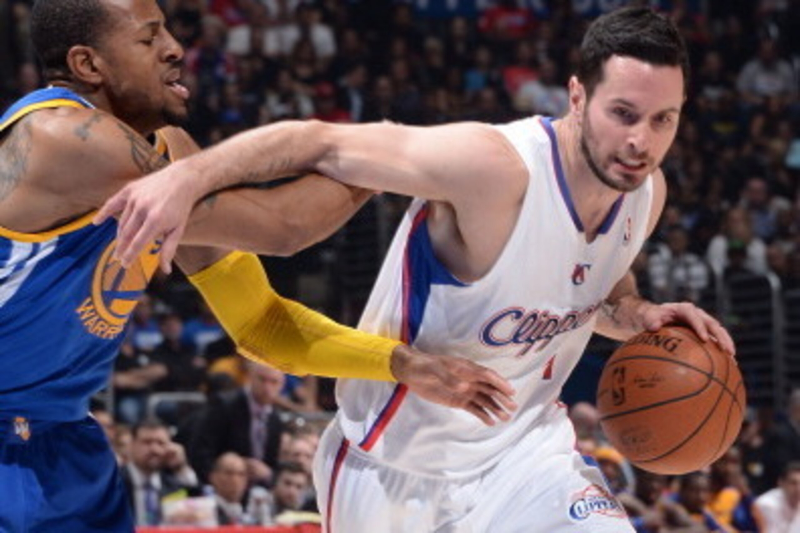 LOS ANGELES, CA - APRIL 29: J.J. Redick #4 of the Los Angeles Clippers handles the ball against the Golden State Warriors in Game Five of the Western Conference Quarterfinals at Staples Center on April 29, 2014 in Los Angeles, California. NOTE TO USER: Us