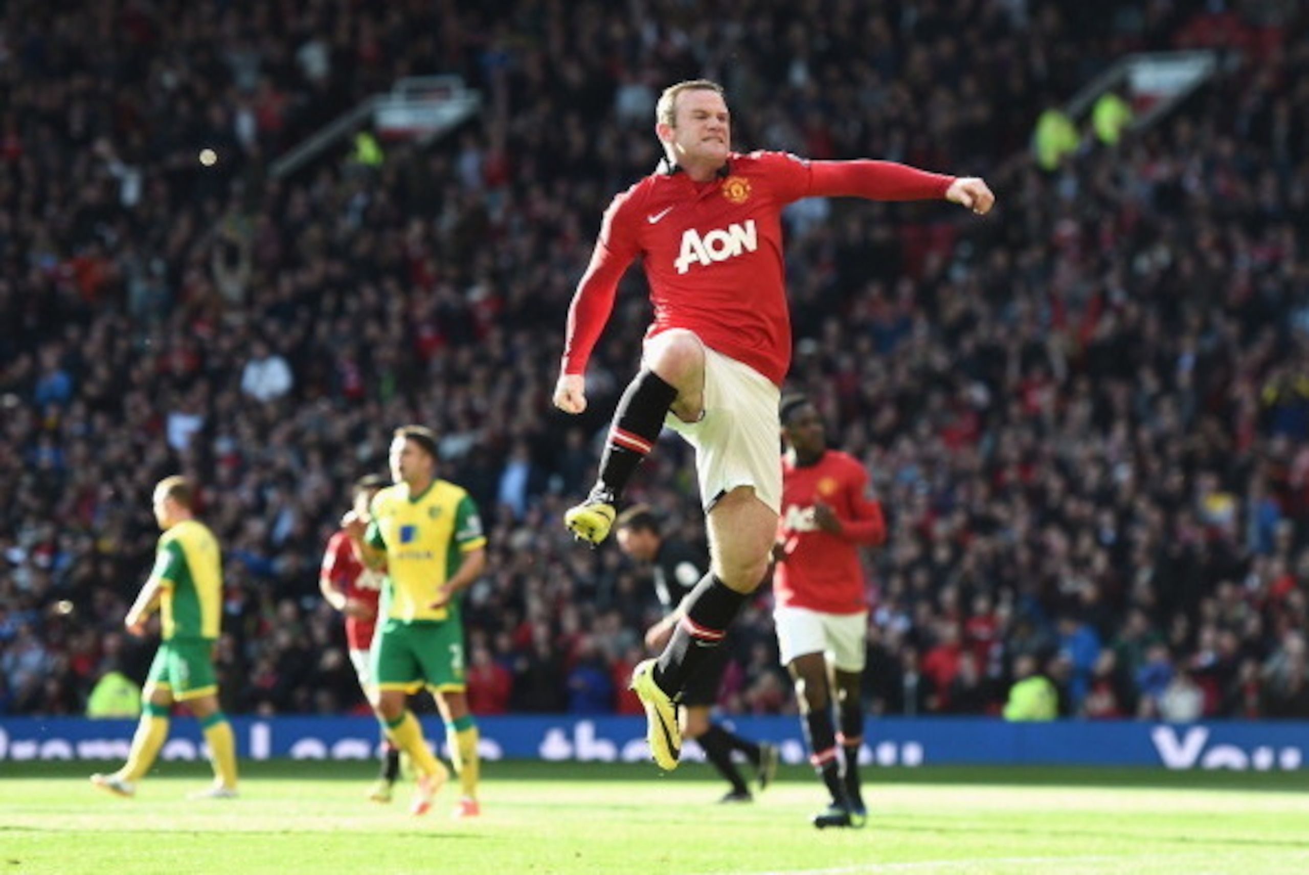 MANCHESTER, ENGLAND - APRIL 26: Wayne Rooney of Manchester United celebrates his first half penalty during the Barclays Premier League match between Manchester United and Norwich City at Old Trafford on April 26, 2014 in Manchester, England.  (Photo by La