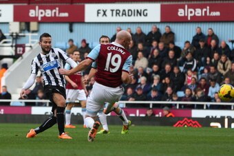 LONDON, ENGLAND - JANUARY 18: Yohan Cabaye of Newcastle United shoots and scores during the Barclays Premier League match between West Ham United and Newcastle United at the Boleyn Ground on January 18, 2014 in London, England. (Photo by Julian Finney/Get