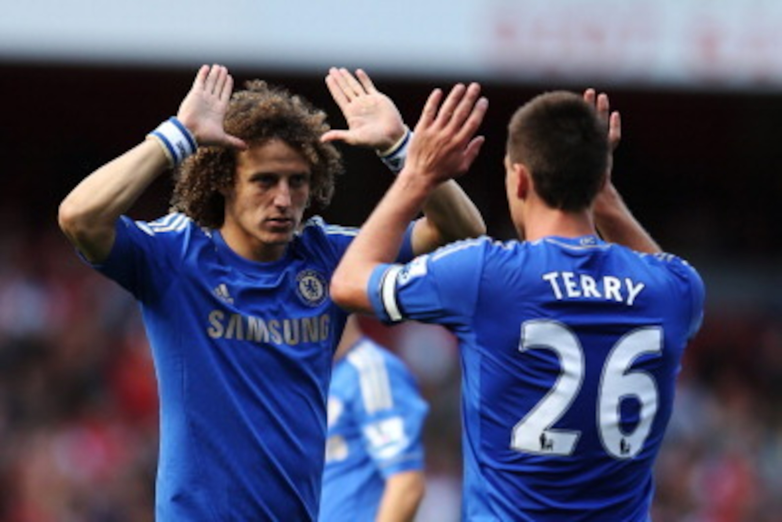 LONDON, ENGLAND - SEPTEMBER 29:  Chelsea's John Terry and David Luiz celebrate after Chelsea defeats Arsenal at the Barclays Premier League match between Arsenal and Chelsea at Emirates Stadium on September 29, 2012 in London, England.  (Photo by Richard 