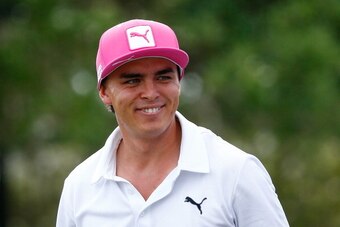 ORLANDO, FL - MARCH 21: Rickie Fowler of the United States smiles as he talks with Brandt Snedeker of the United States on the 11th tee during the second round of the Arnold Palmer Invitational presented by MasterCard at the Bay Hill Club and Lodge on Mar