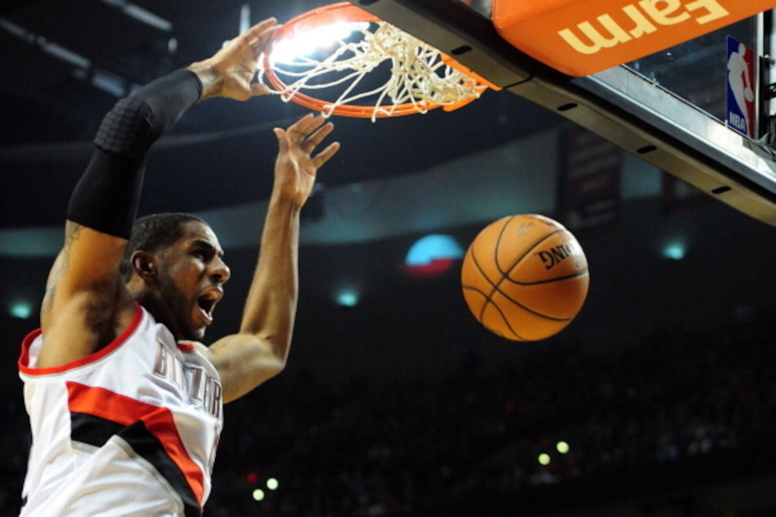 PORTLAND, OR - APRIL  27: LaMarcus Aldridge #12 of the Portland Trail Blazers dunks the ball in the second half of Game Four of the Western Conference Quarterfinals against the Houston Rockets during the 2014 NBA Playoffs at the Moda Center on April 27, 2