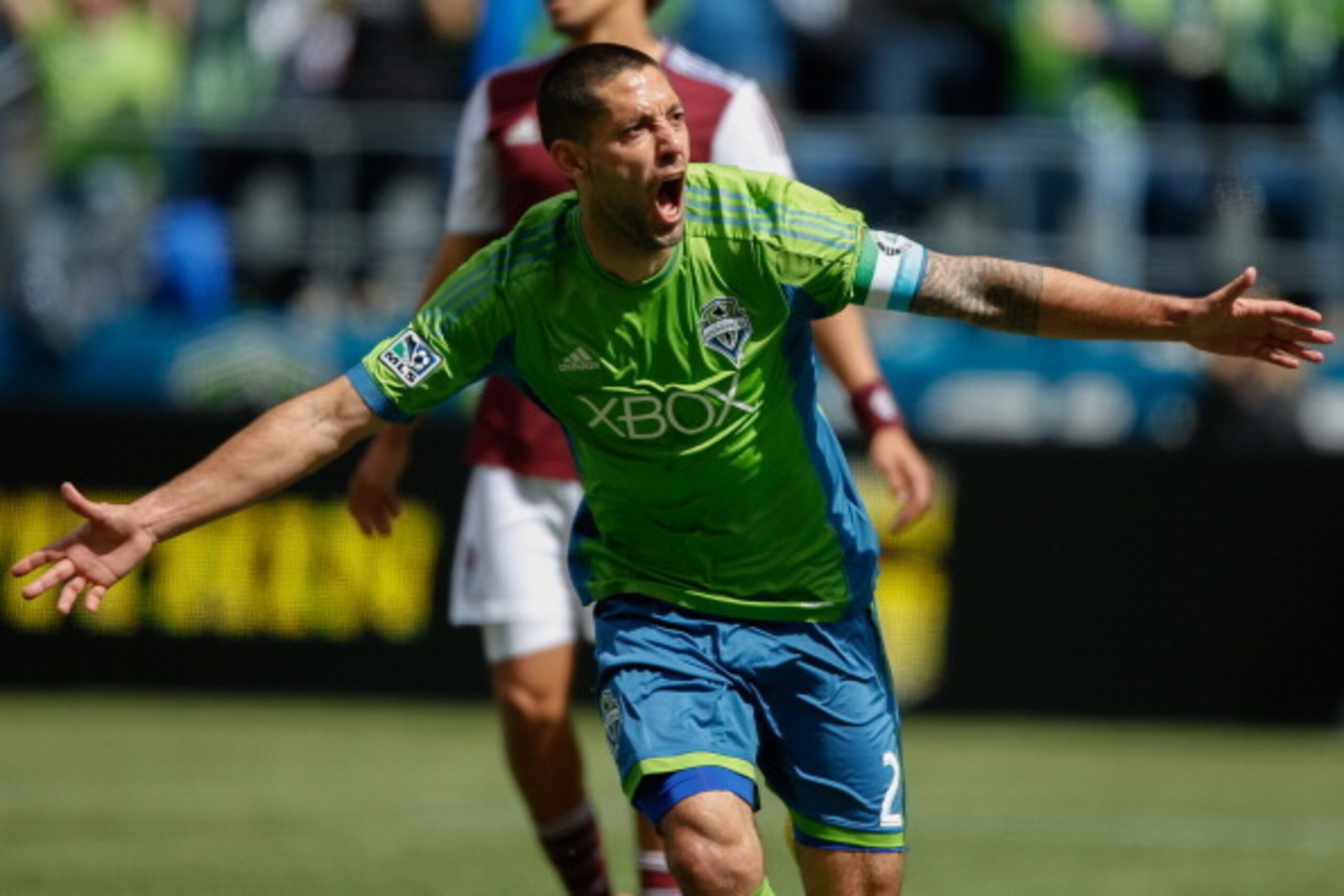 SEATTLE, WA - APRIL 26:  Clint Dempsey #2 of the Seattle Sounders FC reacts after scoring his second goal against the Colorado Rapids at CenturyLink Field on April 26, 2014 in Seattle, Washington. The Sounders defeated the Rapids 4-1.  (Photo by Otto Greu