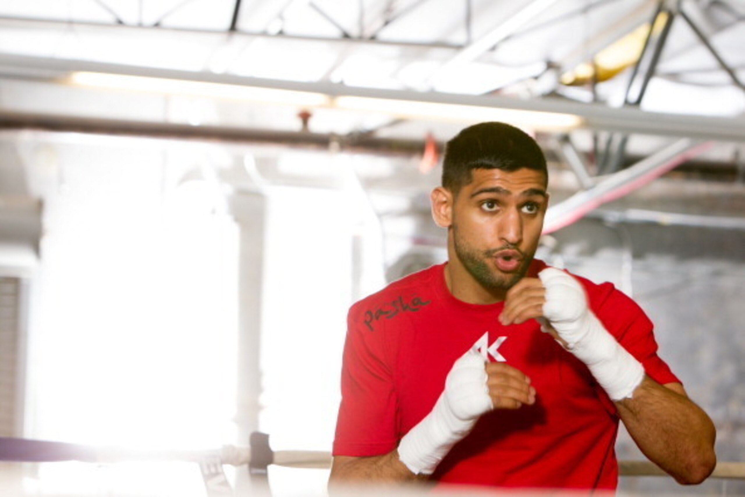 HAYWARD, CA - APRIL 24:  Amir Khan shadow boxes during a workout session at Virgil Hunter's Gym on April 24, 2014 in Hayward, California. Kahn is preparing to take on Luis Collazo at the MGM Grand in Las Vegas on May 3, 2014. (Photo by Alexis Cuarezma/Get