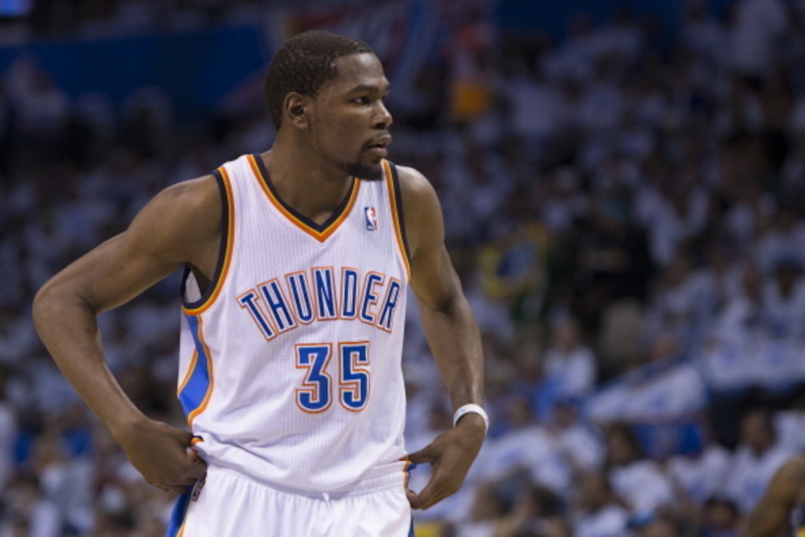 OKLAHOMA CITY, OK - April 29, 2014: Kevin Durant #35 of the Oklahoma City Thunder during the game against the Memphis Grizzlies in Game 5 of the Western Conference Quarterfinals during the 2014 NBA Playoffs at the Chesapeake Arena on April 29, 2014 in Ok OKLAHOMA CITY, OK - April 29, 2014: Kevin Durant #35 of the Oklahoma City Thunder during the game against the Memphis Grizzlies in Game 5 of the Western Conference Quarterfinals during the 2014 NBA Playoffs at the Chesapeake Arena on April 29, 2014 in Ok