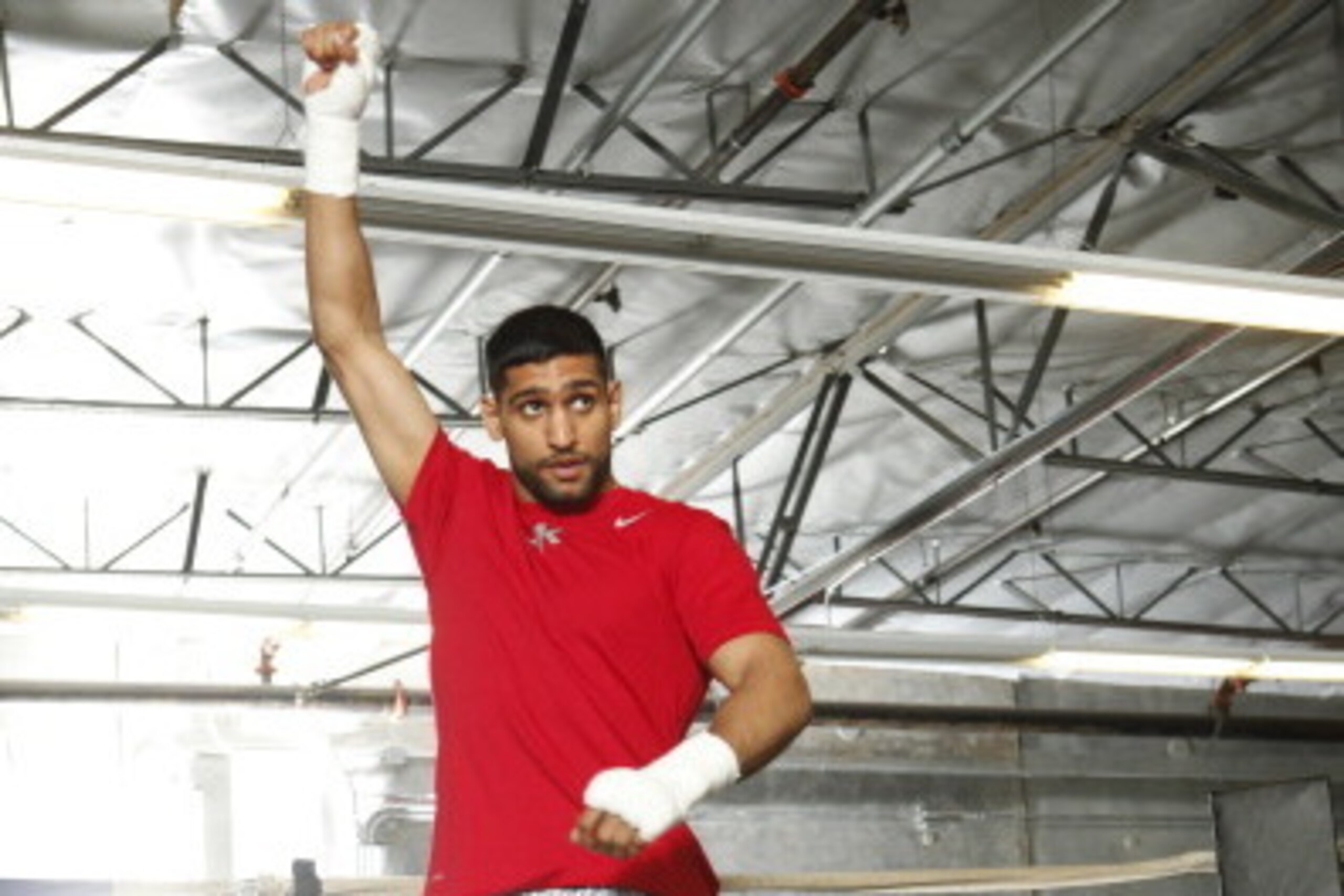 HAYWARD, CA - APRIL 24:  Amir Khan in action during a workout session at Virgil Hunter's Gym on April 24, 2014 in Hayward, California. Kahn is preparing to take on Luis Collazo at the MGM Grand in Las Vegas on May 3, 2014. (Photo by Alexis Cuarezma/Getty 