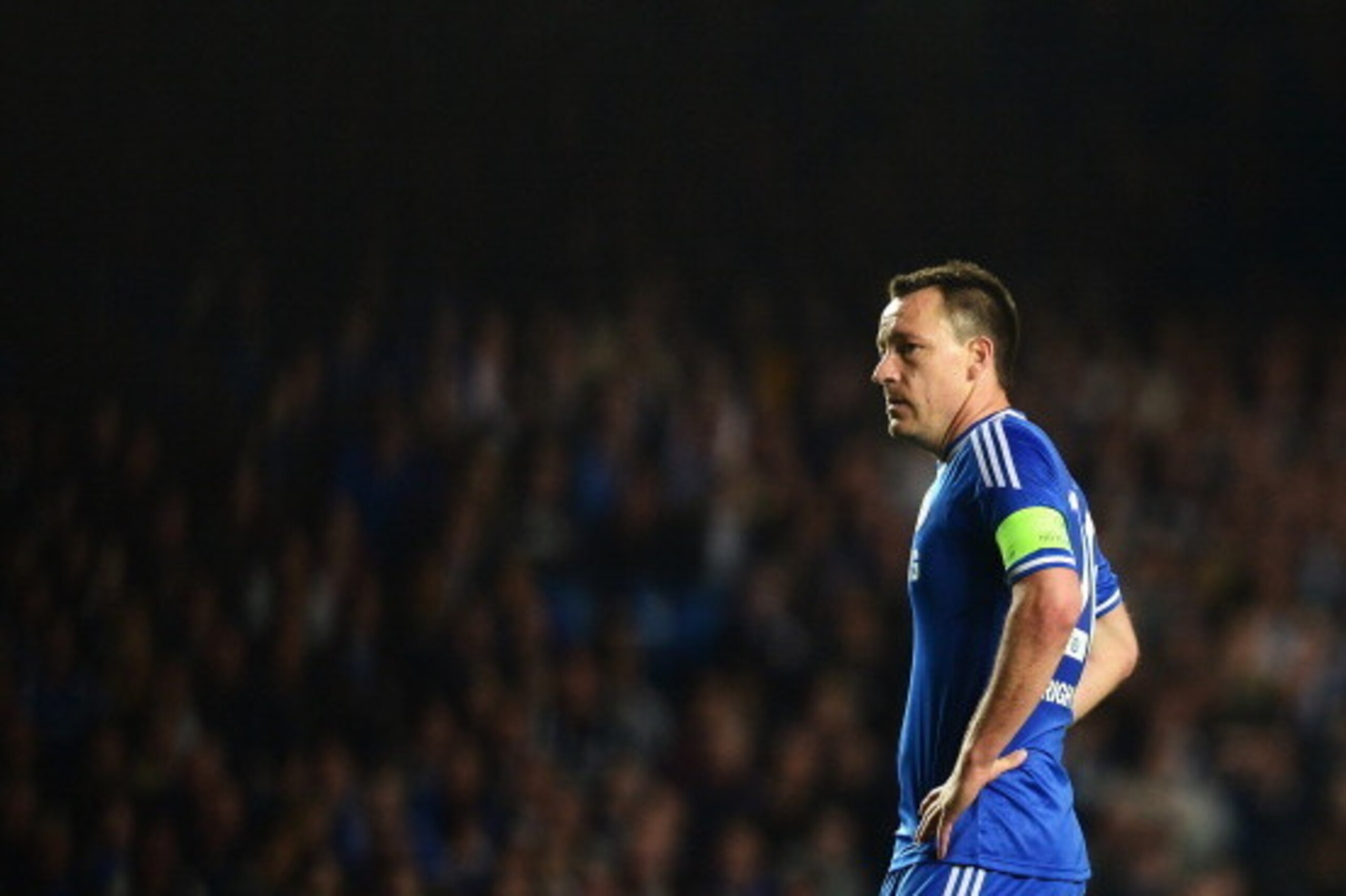 LONDON, ENGLAND - APRIL 30:  John Terry of Chelsea looks dejected during the UEFA Champions League semi-final second leg match between Chelsea and Club Atletico de Madrid at Stamford Bridge on April 30, 2014 in London, England.  (Photo by Jamie McDonald/G