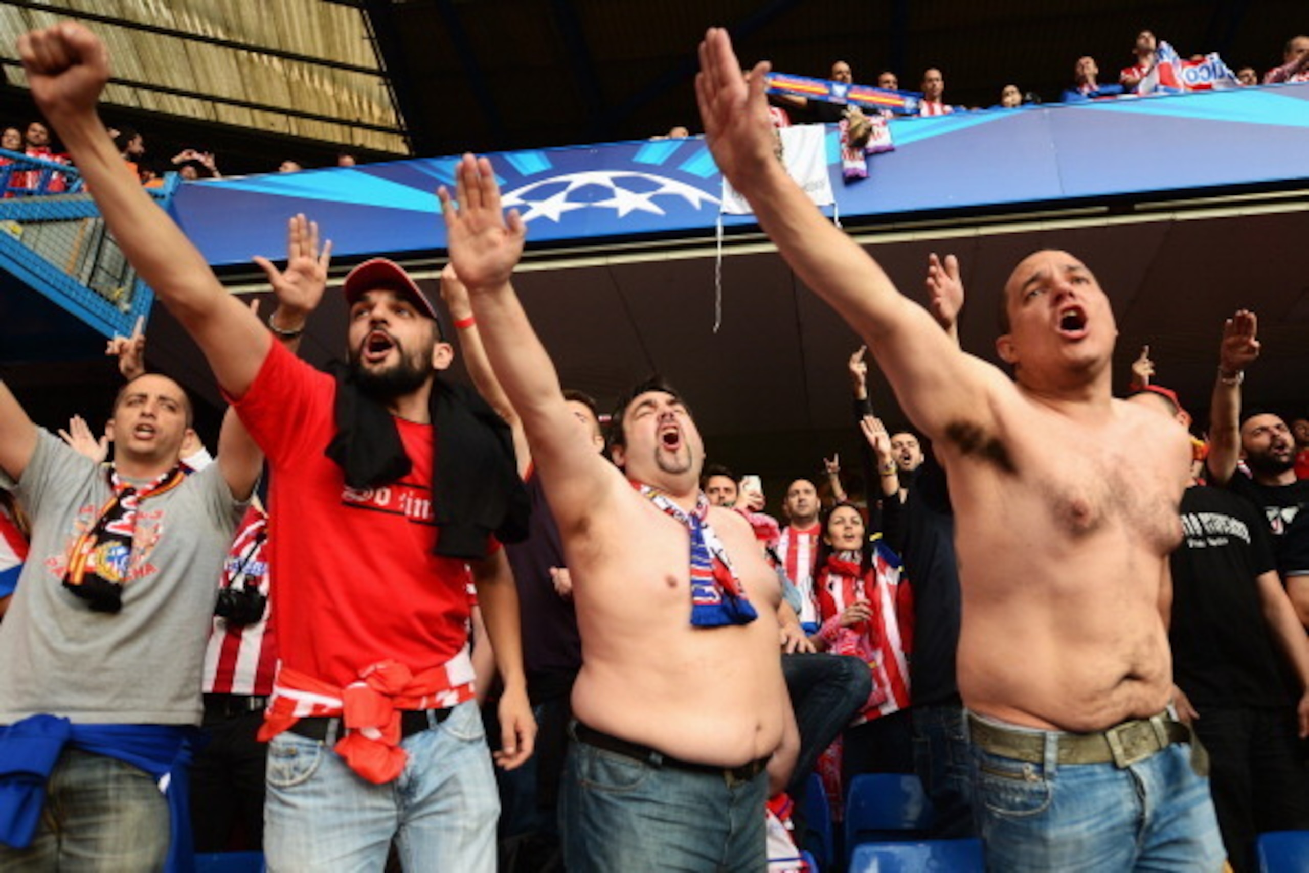 LONDON, ENGLAND - APRIL 30:  Club Atletico de Madrid fans sing during the UEFA Champions League semi-final second leg match between Chelsea and Club Atletico de Madrid at Stamford Bridge on April 30, 2014 in London, England.  (Photo by Jamie McDonald/Gett