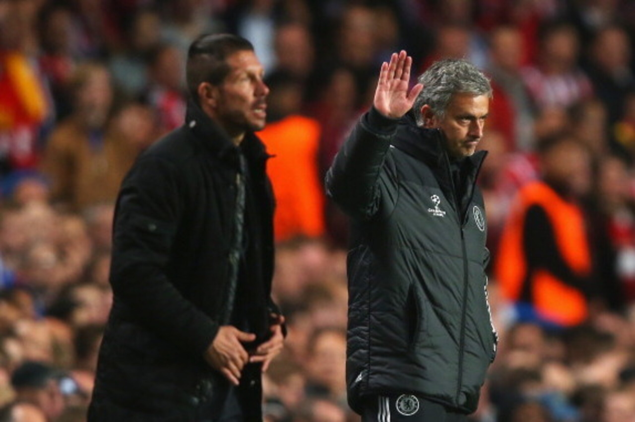 LONDON, ENGLAND - APRIL 30:  Jose Mourinho, manager of Chelsea acknowledges the crowd with Diego Simeone, coach of Club Atletico de Madrid during the UEFA Champions League semi-final second leg match between Chelsea and Club Atletico de Madrid at Stamford