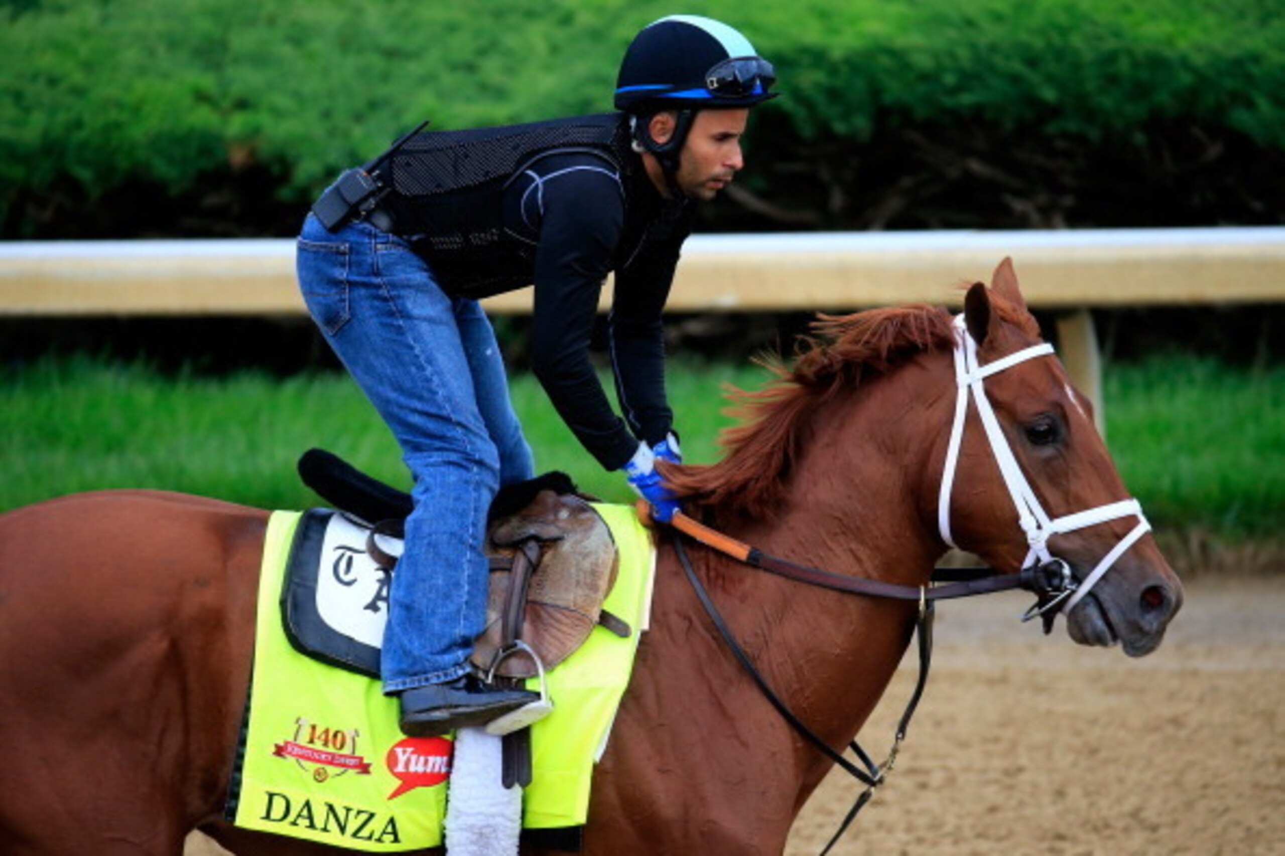 LOUISVILLE, KY - APRIL 30: Danza ridden by Ezequiel Perez goes over the track during the morning exercise session in preparation for the 140th Kentucky Derby at Churchill Downs on April 30, 2014 in Louisville, Kentucky. (Photo by Rob Carr/Getty Images) LOUISVILLE, KY - APRIL 30: Danza ridden by Ezequiel Perez goes over the track during the morning exercise session in preparation for the 140th Kentucky Derby at Churchill Downs on April 30, 2014 in Louisville, Kentucky. (Photo by Rob Carr/Getty Images)