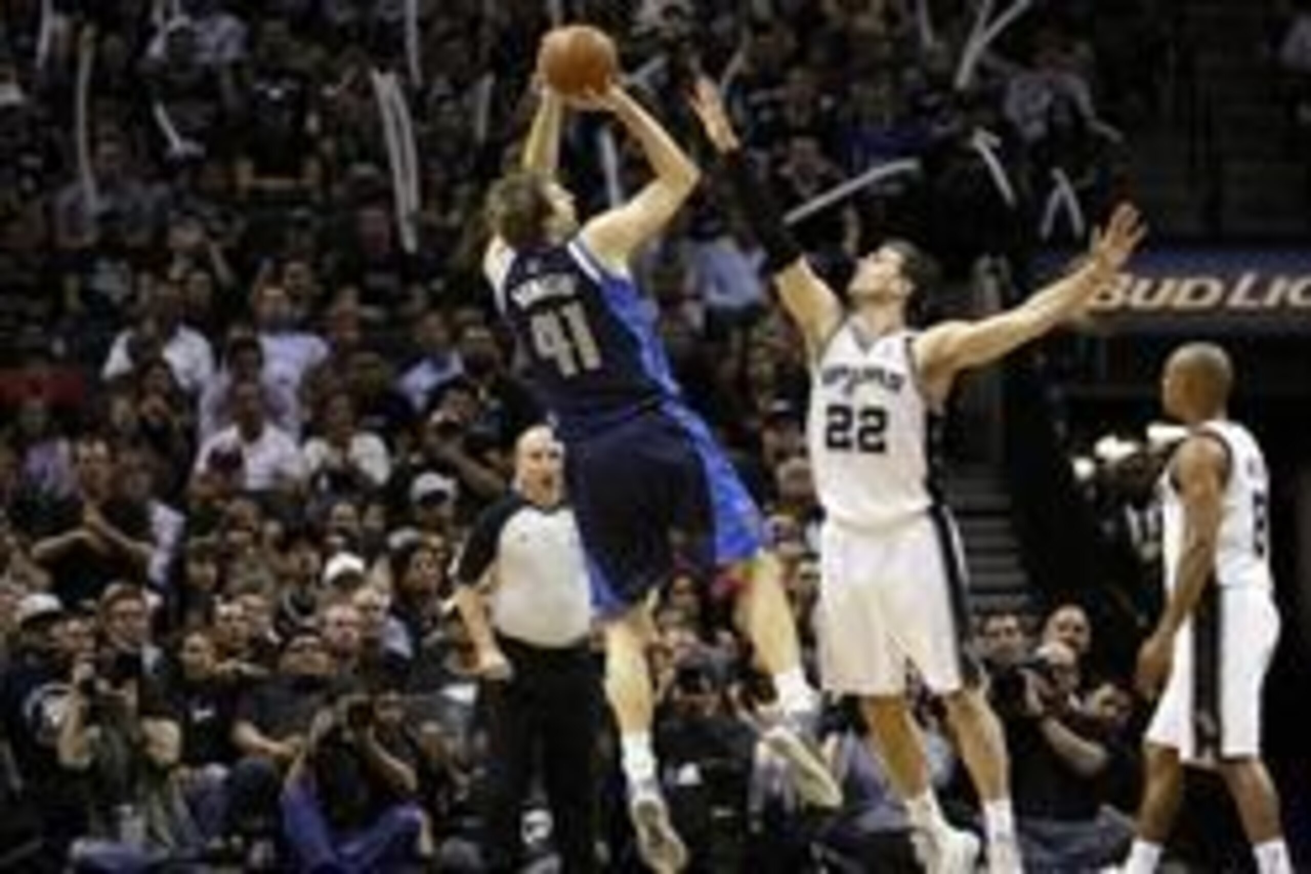 Apr 30, 2014; San Antonio, TX, USA; Dallas Mavericks player Dirk Nowitzki (41) shoots the ball over San Antonio Spurs forward Tiago Splitter (22) in game five of the first round of the 2014 NBA Playoffs at AT&T Center. The Spurs won 109-103. Mandatory Cre