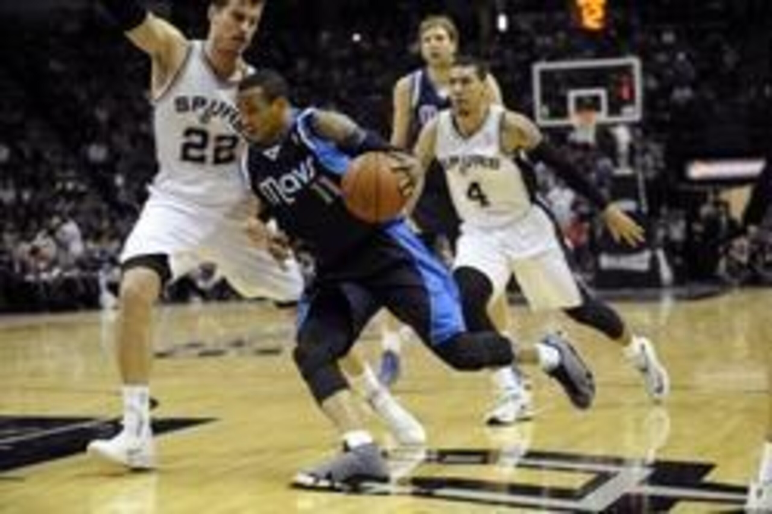 Apr 30, 2014; San Antonio, TX, USA; Dallas Mavericks guard Monta Ellis (11) drives against San Antonio Spurs forward Tiago Splitter (22) in game five of the first round of the 2014 NBA Playoffs at AT&T Center. San Antonio beat Dallas 109-103. Mandatory Cr