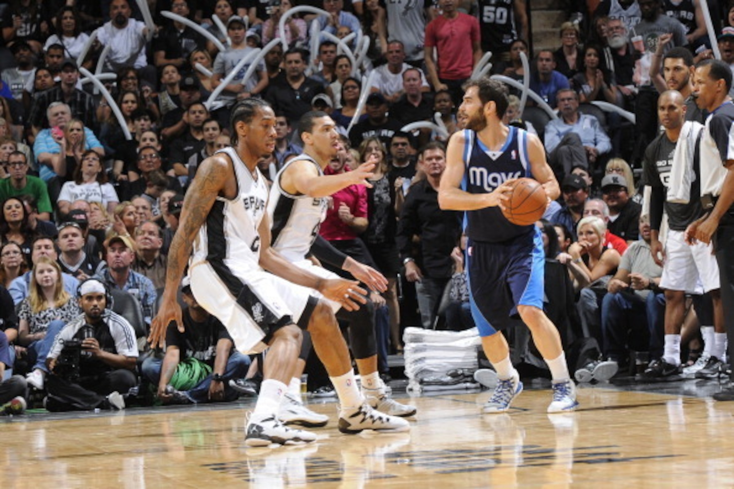 SAN ANTONIO, TX - April 30: Jose Calderon #8 of the Dallas Mavericks handles the ball against the San Antonio Spurs in Game Five of the Western Conference Quarterfinals during the NBA Playoffs at AT&T Center on April 30, 2014 in San Antonio, Texas. NOTE T