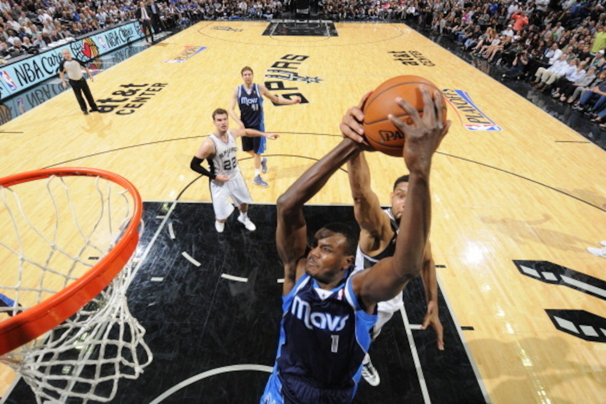 SAN ANTONIO, TX - April 30: Samuel Dalembert #1 of the Dallas Mavericks goes to the basket against the San Antonio Spurs in Game Five of the Western Conference Quarterfinals during the NBA Playoffs at AT&T Center on April 30, 2014 in San Antonio, Texas. N
